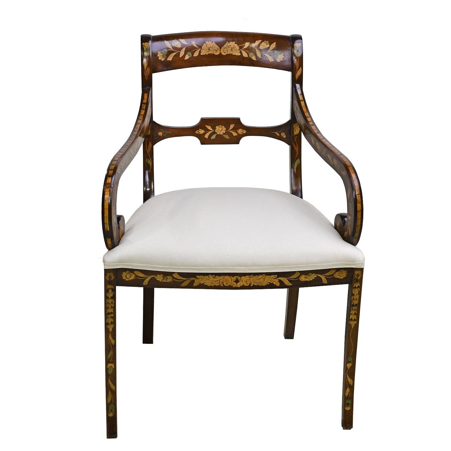A very beautiful English Regency chair in mahogany with floral & foliate inlays in satinwood & kingwood, with scrolled arms and saber legs. England, possibly British colonial, circa 1820. Restored in our atelier with a French-polish finish and
