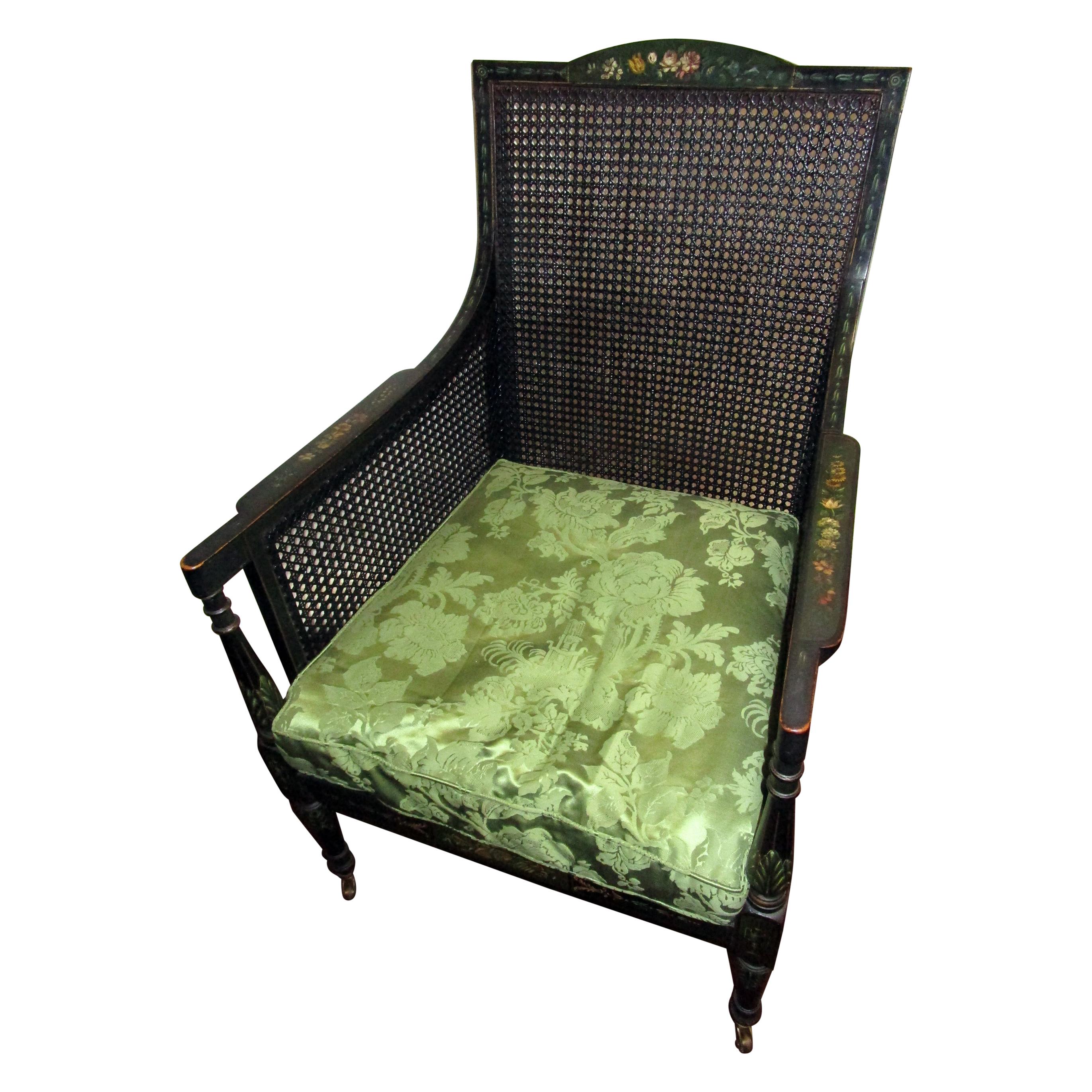 English Regency Bergere Chair Painted Ebonized Wood and Cane For Sale