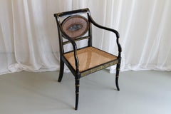 English Regency Black and Gold Armchair, 19th Century.