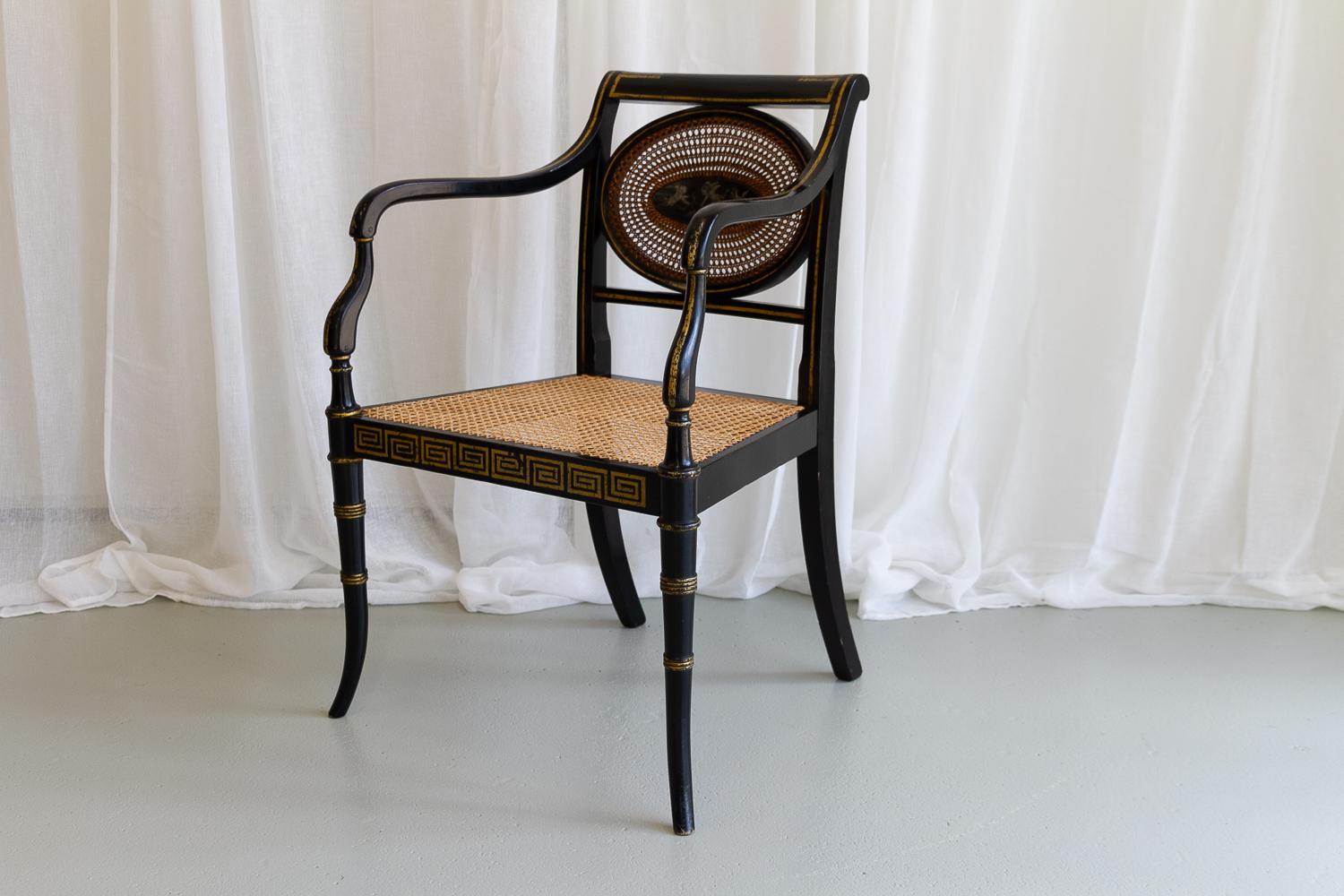 Cane English Regency Black and Gold Armchair, 19th Century.