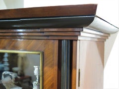 English Regency Bookcase of Mahogany with Gilt Bronze and Ebonized Ornament