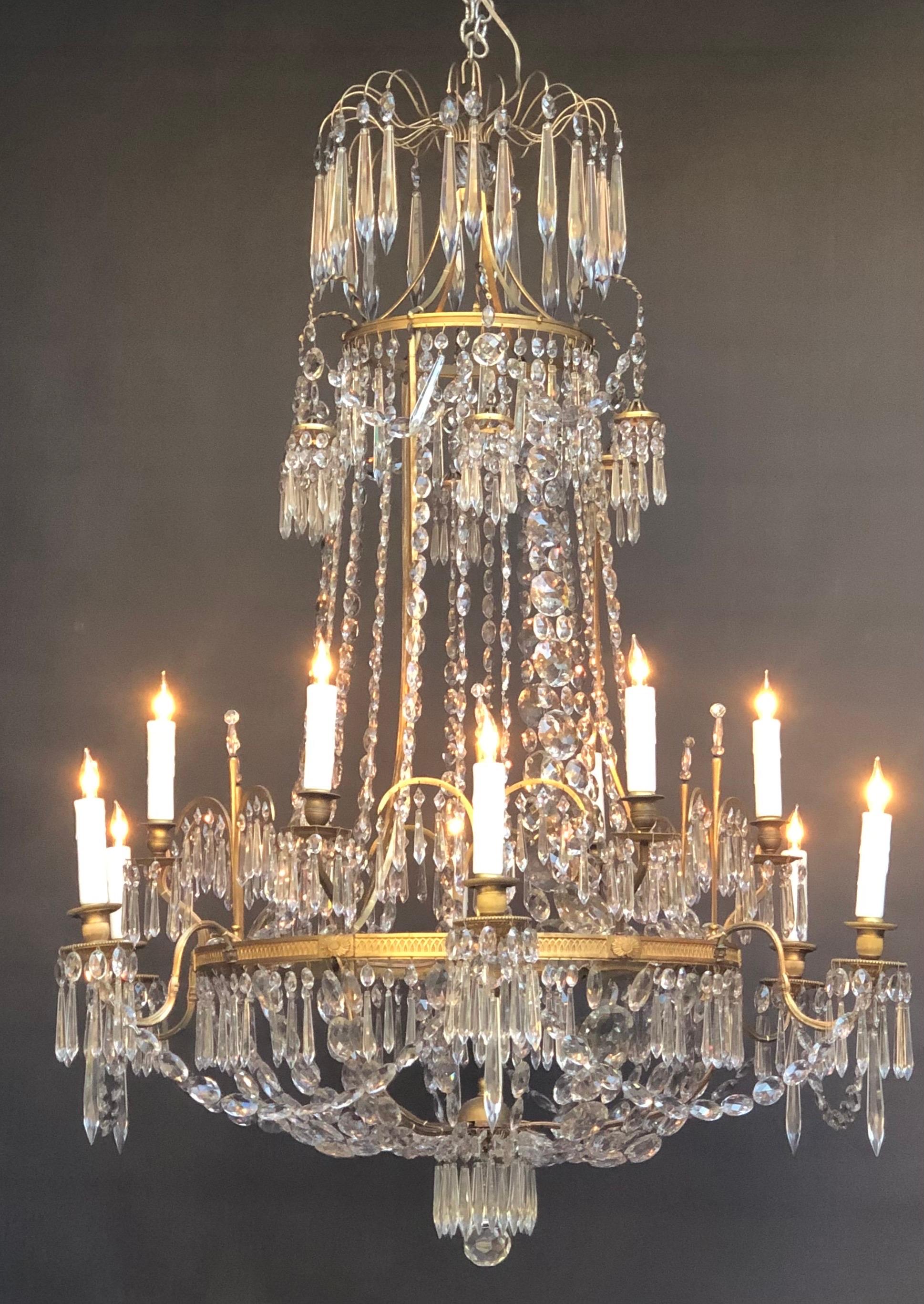 Neoclassical English Regency Brass And Crystal Twelve Candle Chandelier