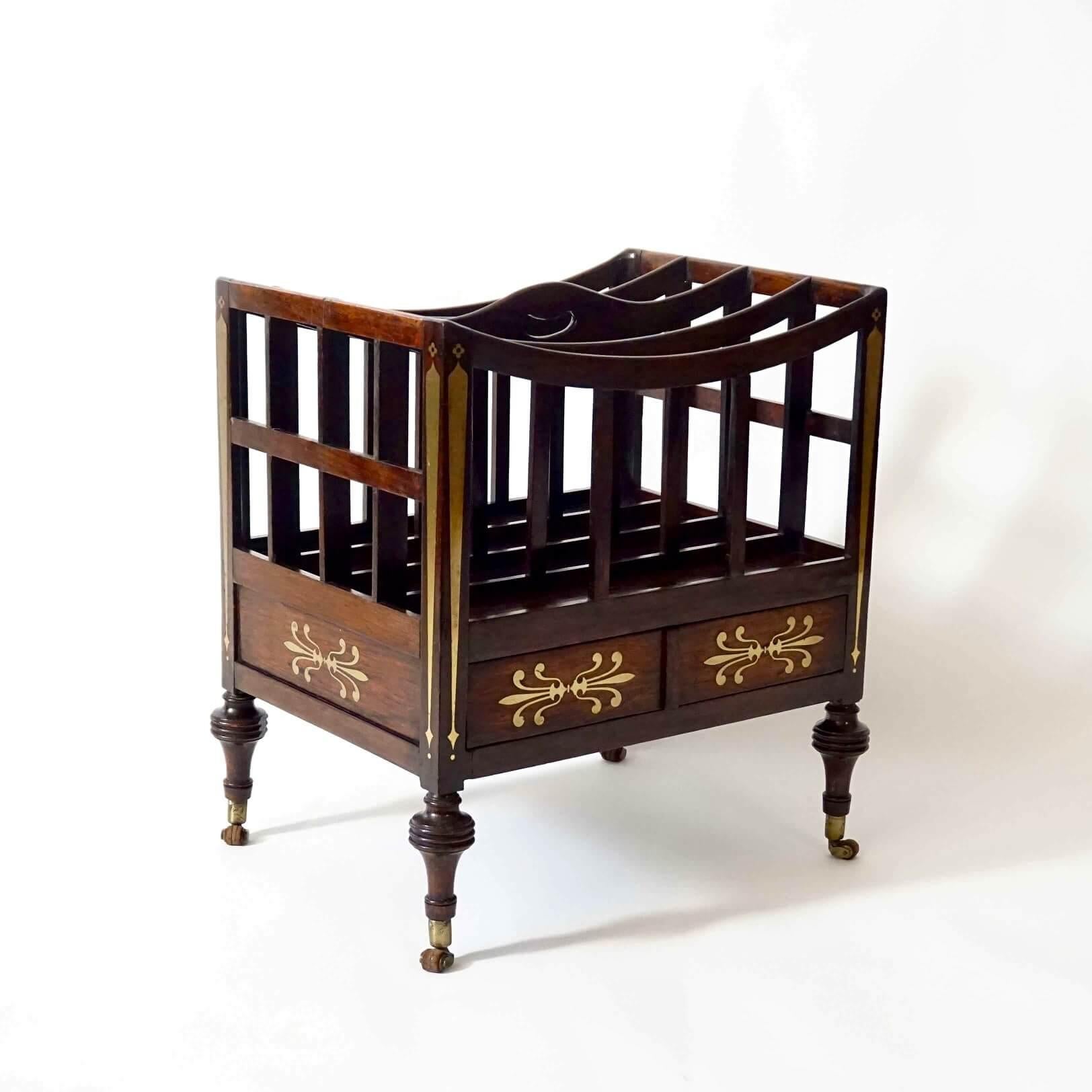 An exceptional circa 1815 English regency period canterbury attributed to London cabinetmaker George Oakley, the brass-inlaid solid rosewood case of rectangular form with upper navette-form 'rack' divided into four-sections with center handle above