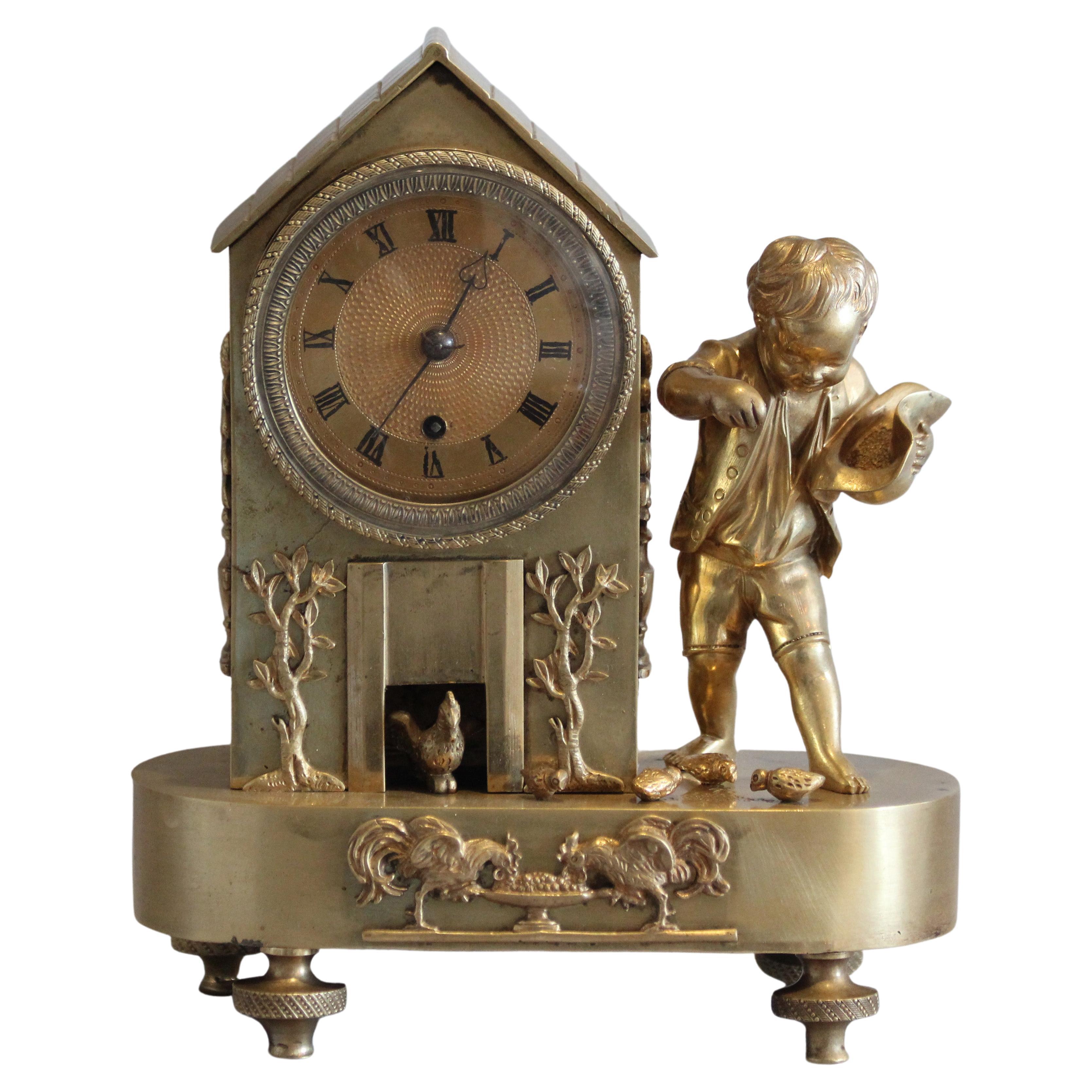 English Regency Bronze Arcadian "Genre" Mantel Clock of Boy Feeding Chickens For Sale