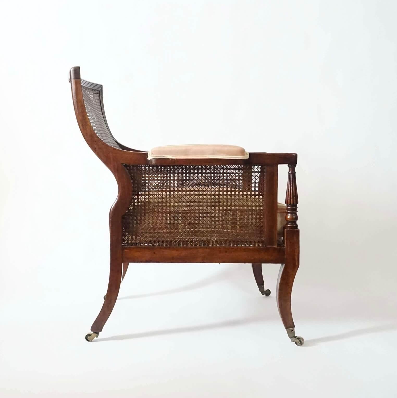 Hand-Carved English Regency Caned Mahogany Bergère or Armchair of Large Scale, circa 1810