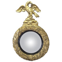 Miroir à œil de bœuf convexe, doré à l'aigle, de style Régence anglaise