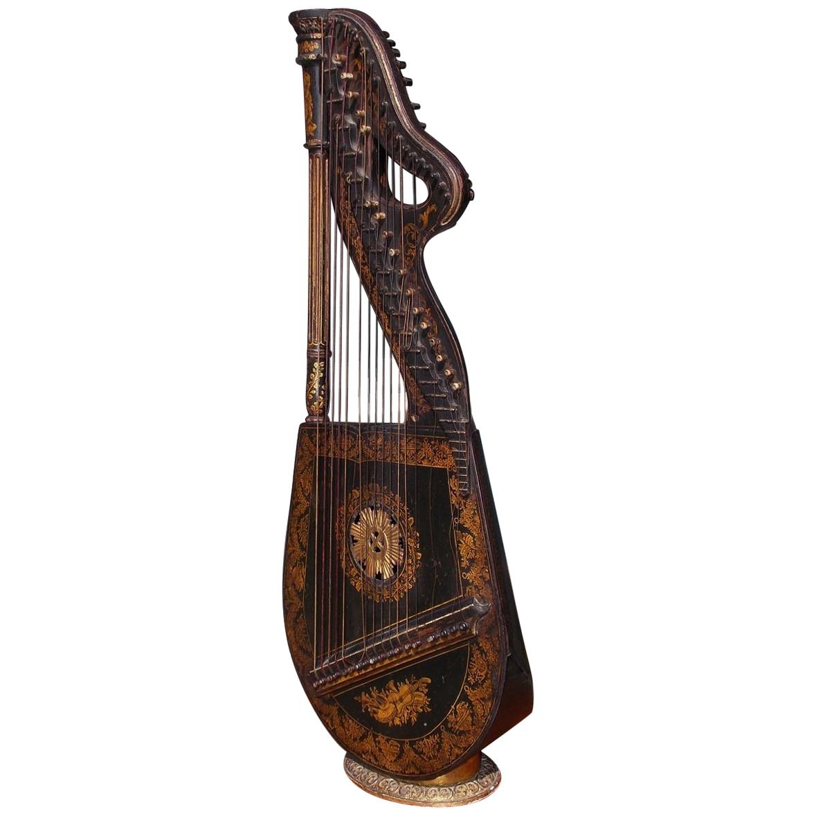 Harpe figurative et ébénisée de style Régence anglaise, fabriquée par E. Light, vers 1815