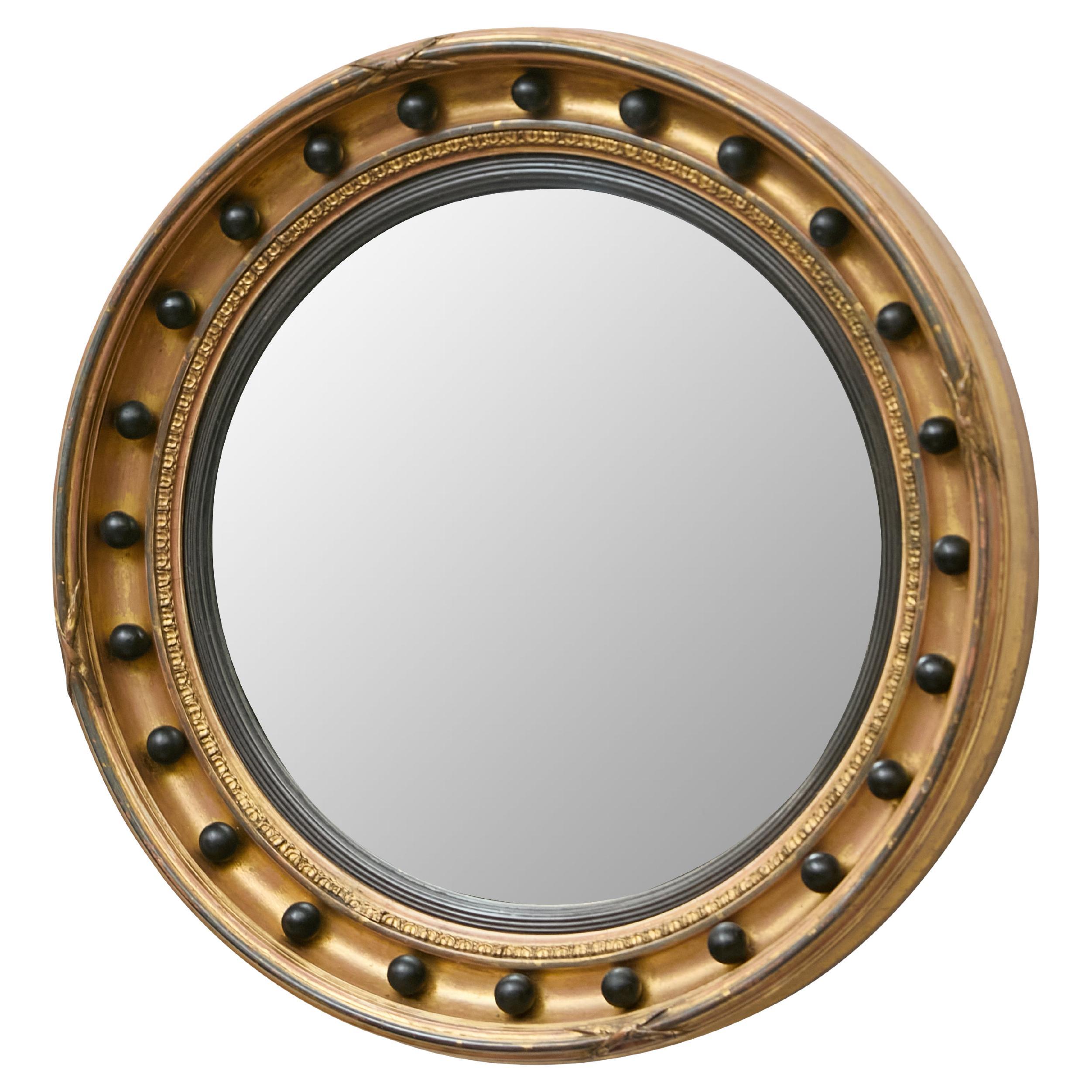 Miroir convexe en bois doré de style Régence anglaise avec accents Ball and Ball ébonisés en vente