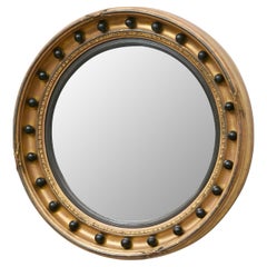 Miroir convexe en bois doré de style Régence anglaise avec accents Ball and Ball ébonisés