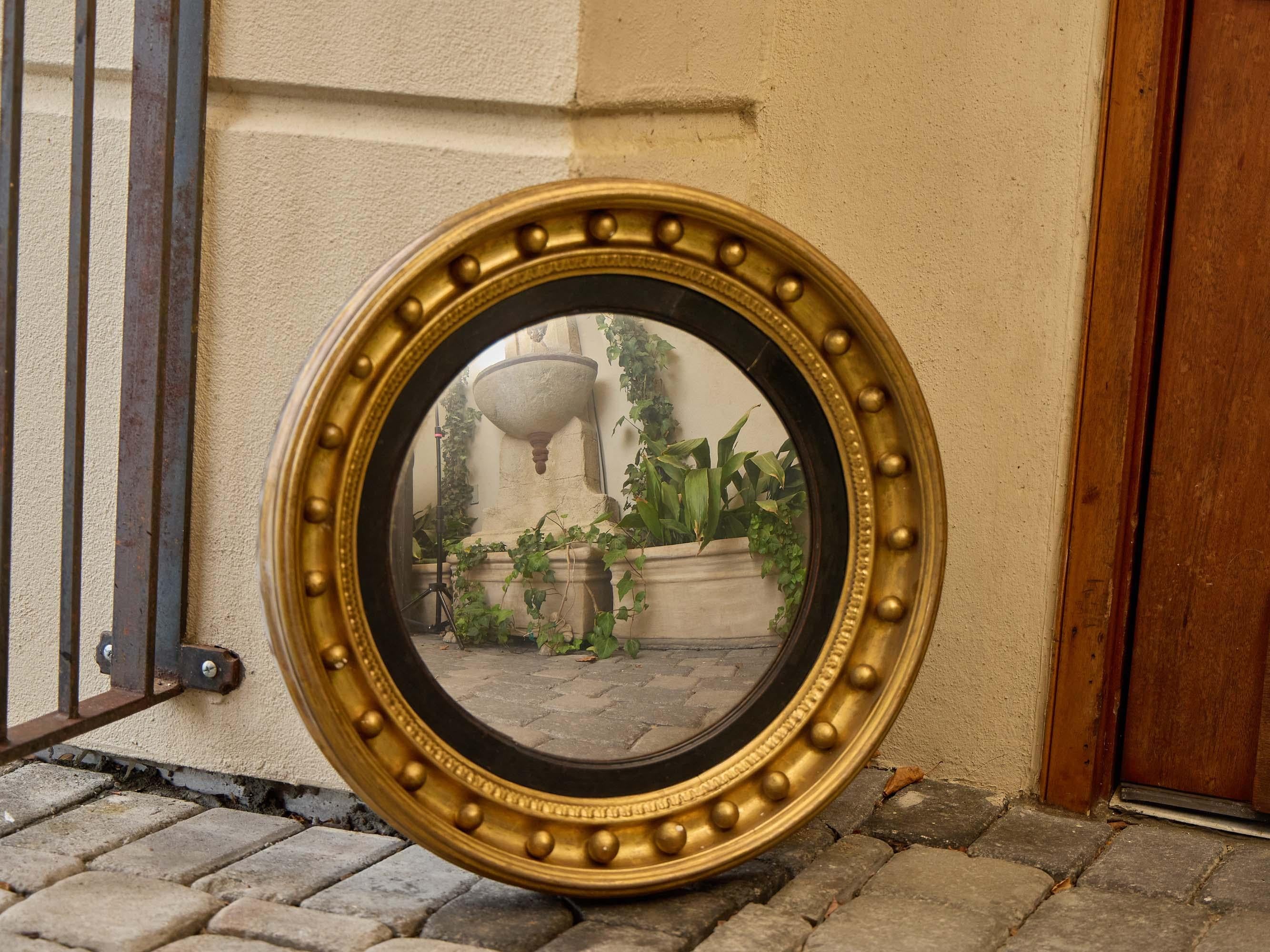 Specchio convesso in legno dorato inglese Regency con finiture ebanizzate, XIX secolo in vendita 6