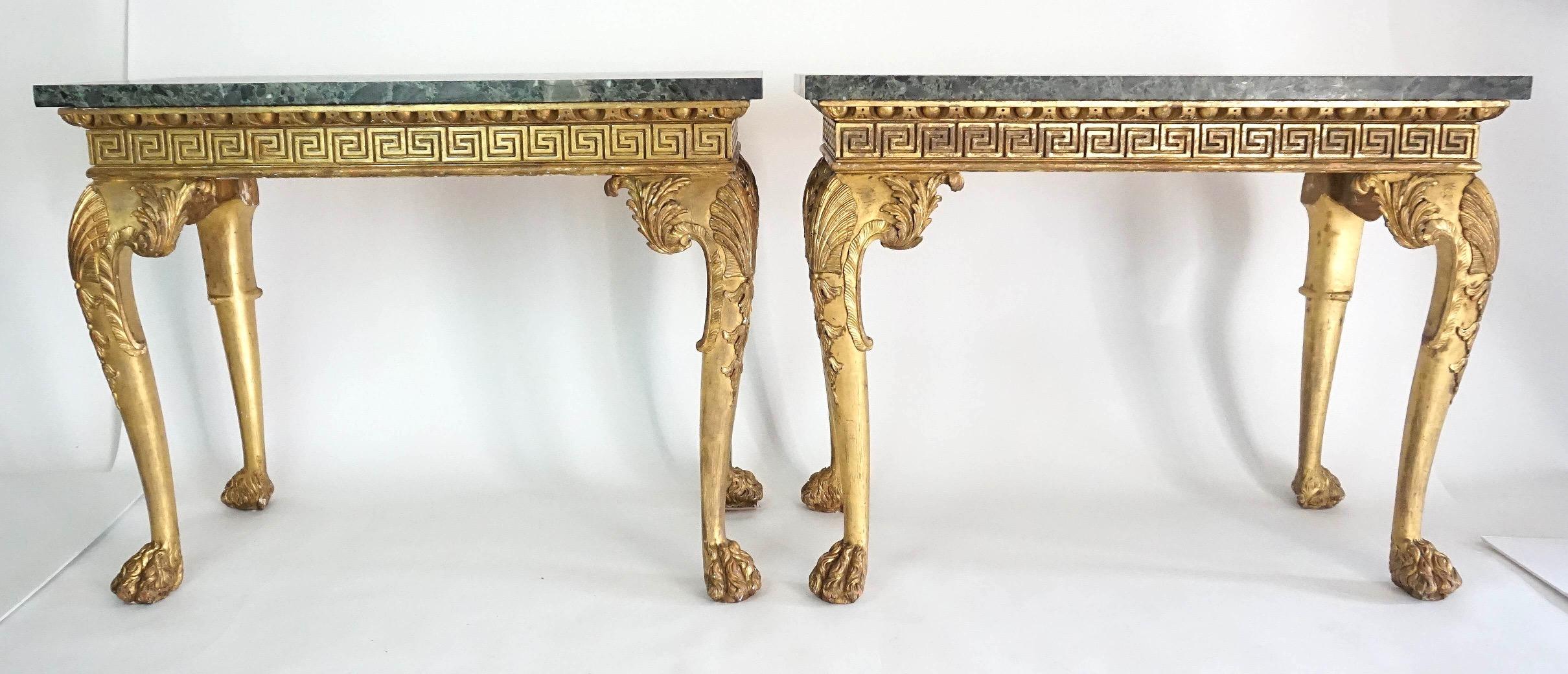 Exquisite and important pair of circa 1815 Anglo-Irish regency console or side tables in the manner of William Kent having original verde antico marble tops on original-finish giltwood bases with egg-and-dart moulding above Greek key frieze on