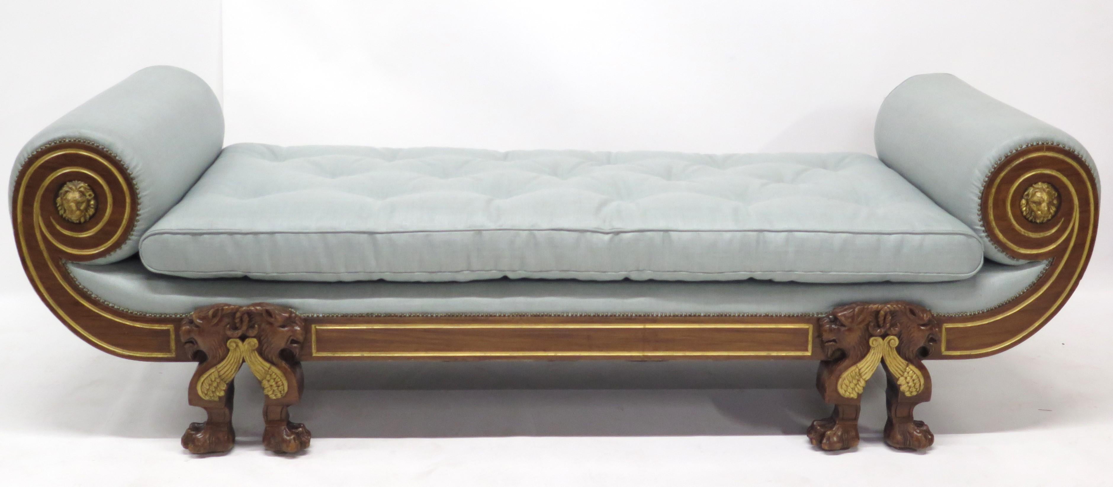 an english regency grecian couch/daybed in the manner of Thomas Hope, carved and gilded mahogany frame, with horned winged lion's ( griffin ) paw feet, four feet on the front, two on the back, gilt lions masks / medallions each end front side, the