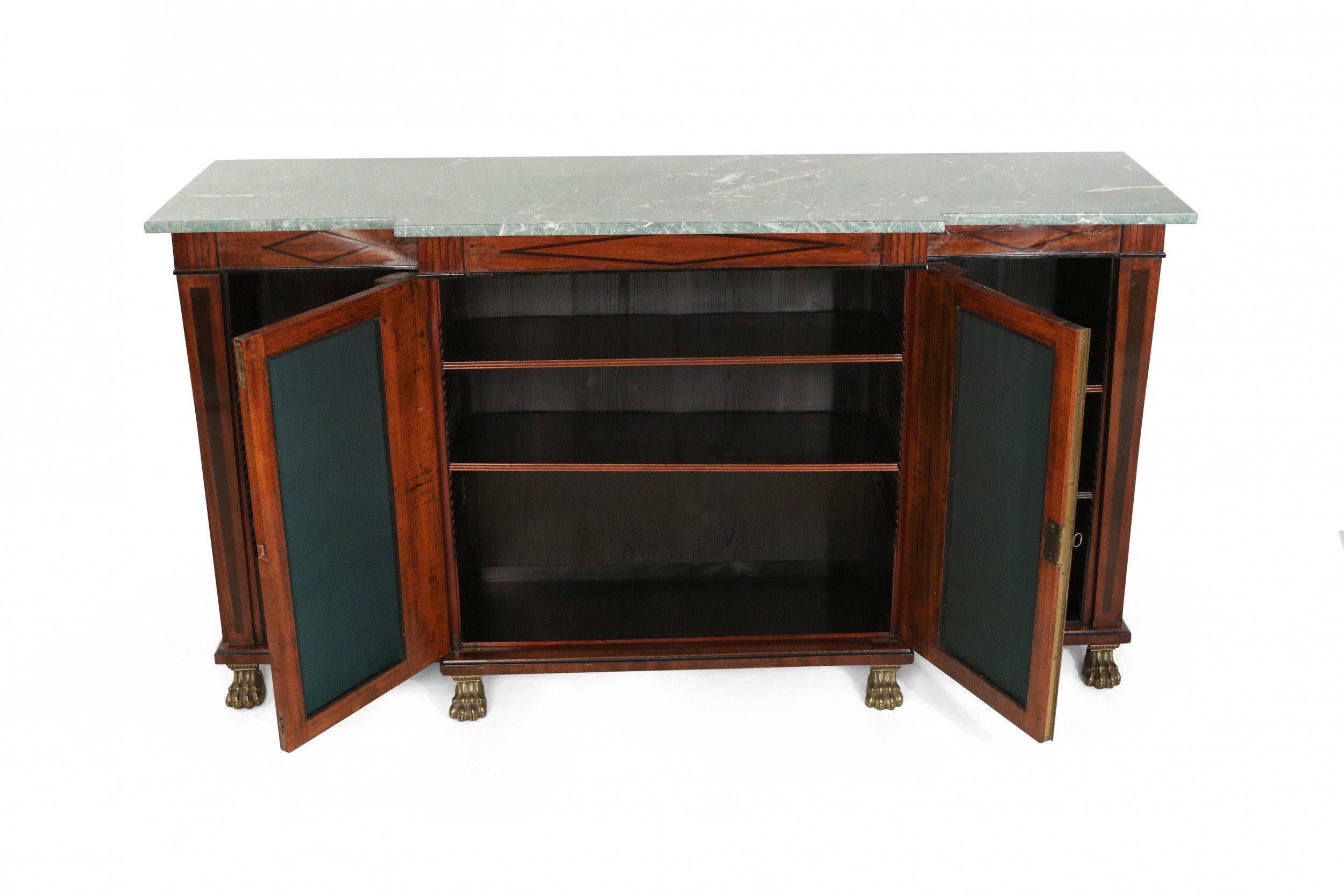 English Regency mahogany & ebonized inlaid triim credenza with open side compartments containing two adjustable shelves and centering doors having a brass diamond screen with green fabric paneled under a green marble top