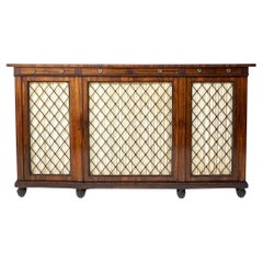 Consolle in legno di palissandro con sportello a griglia, Att. Gillows, circa 1820