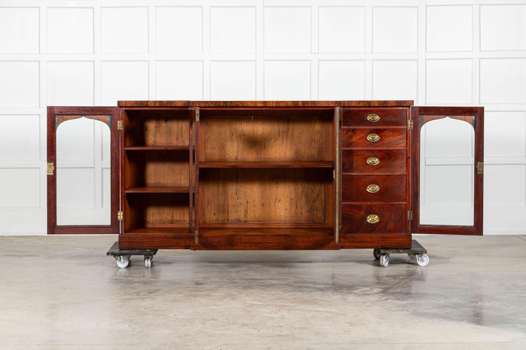 circa 1800
sku 2053
English Regency Mahogany Breakfront Sideboard

W181.5 x D47 x H91 cm
Middle section internal shelf depth39 cm
Left section internal shelf depth 34 cm
Weight 75Kg