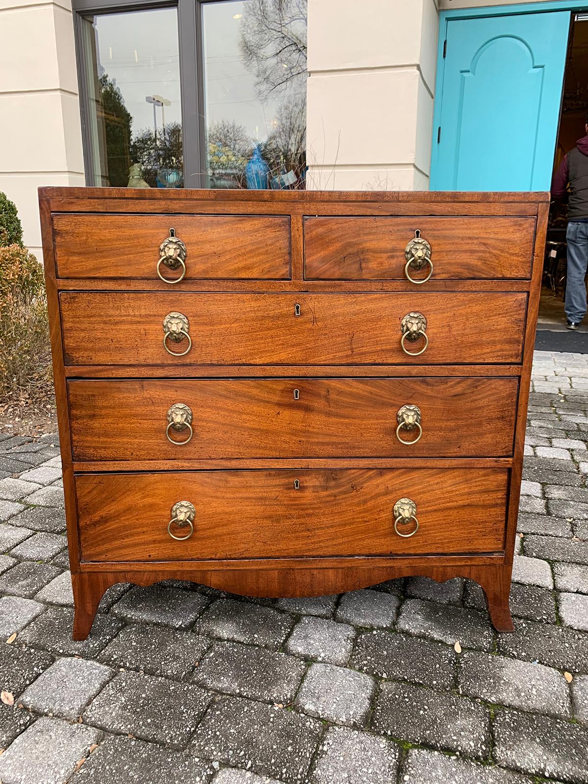 English Regency mahogany caddy top chest with lion pulls, circa 1820s
Five drawers
Brass lion head pulls
Serpentine shaped apron.