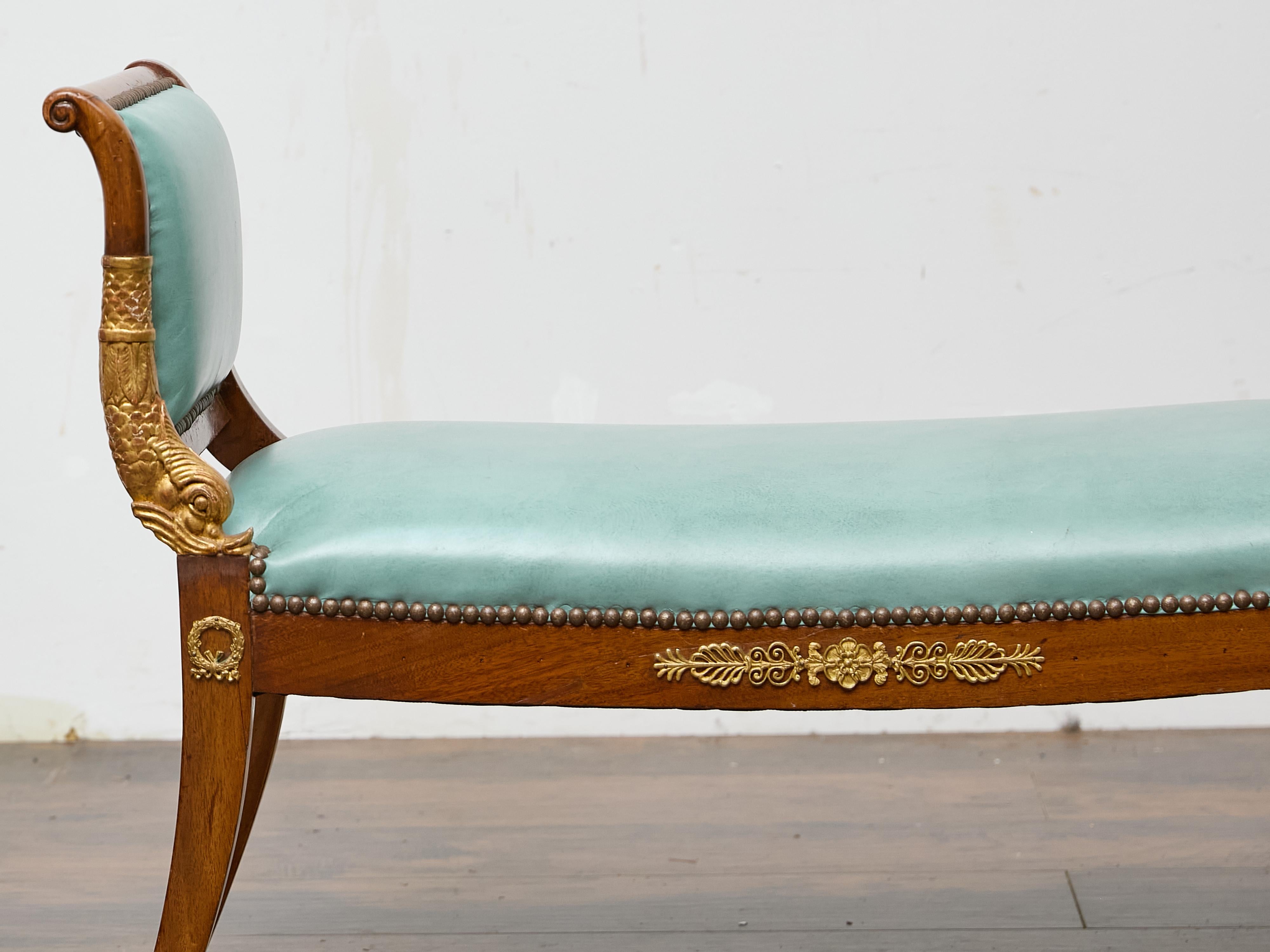 Carved English Regency Mahogany Leather Bench with Gilt Dolphin Armrests For Sale