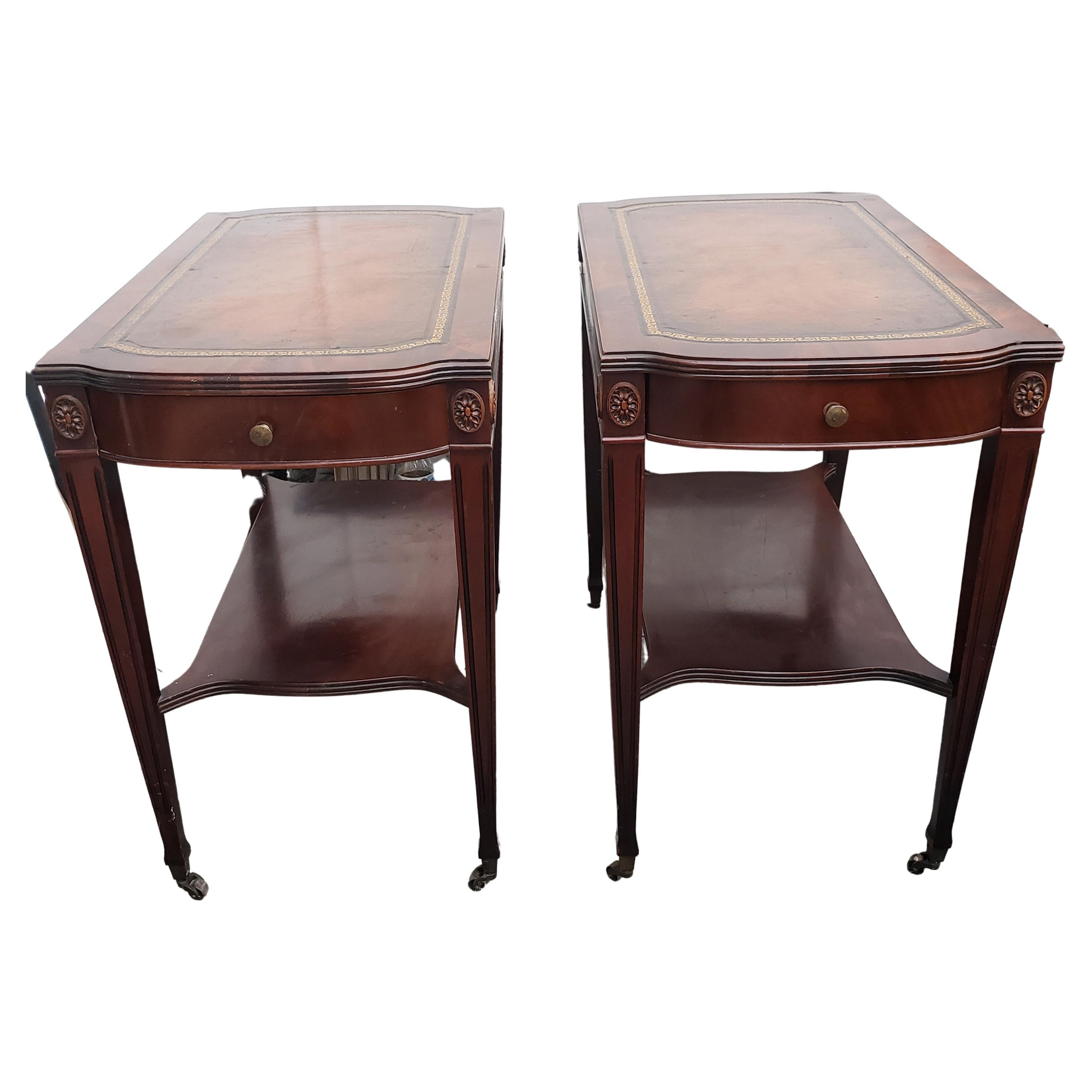 Marvelous pair of mahogany wood tables from the 1930s by Weiman. Very well maintained. They measure 25