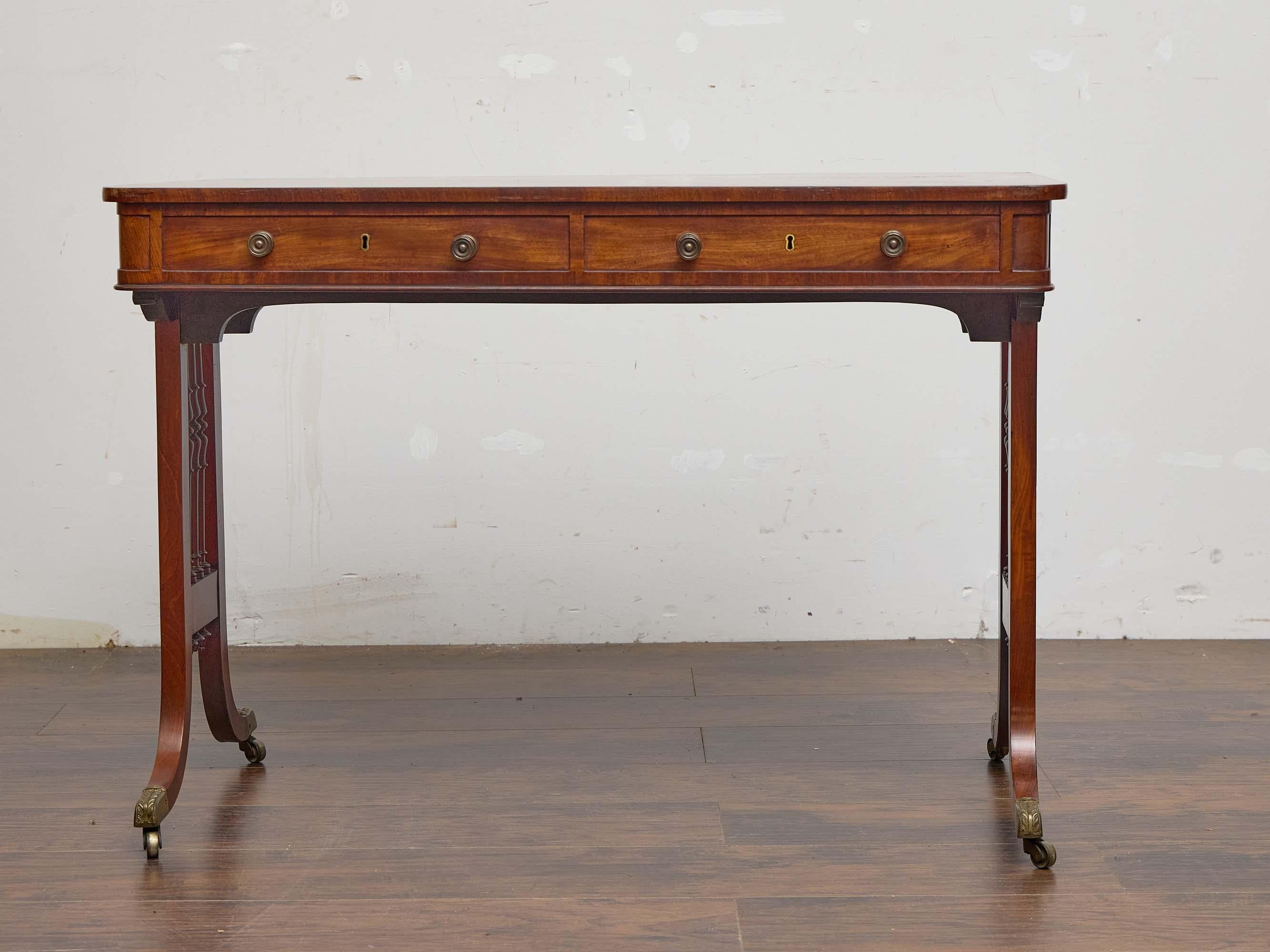English Regency Mahogany Writing Desk with Pierced Sides and Casters For Sale 1