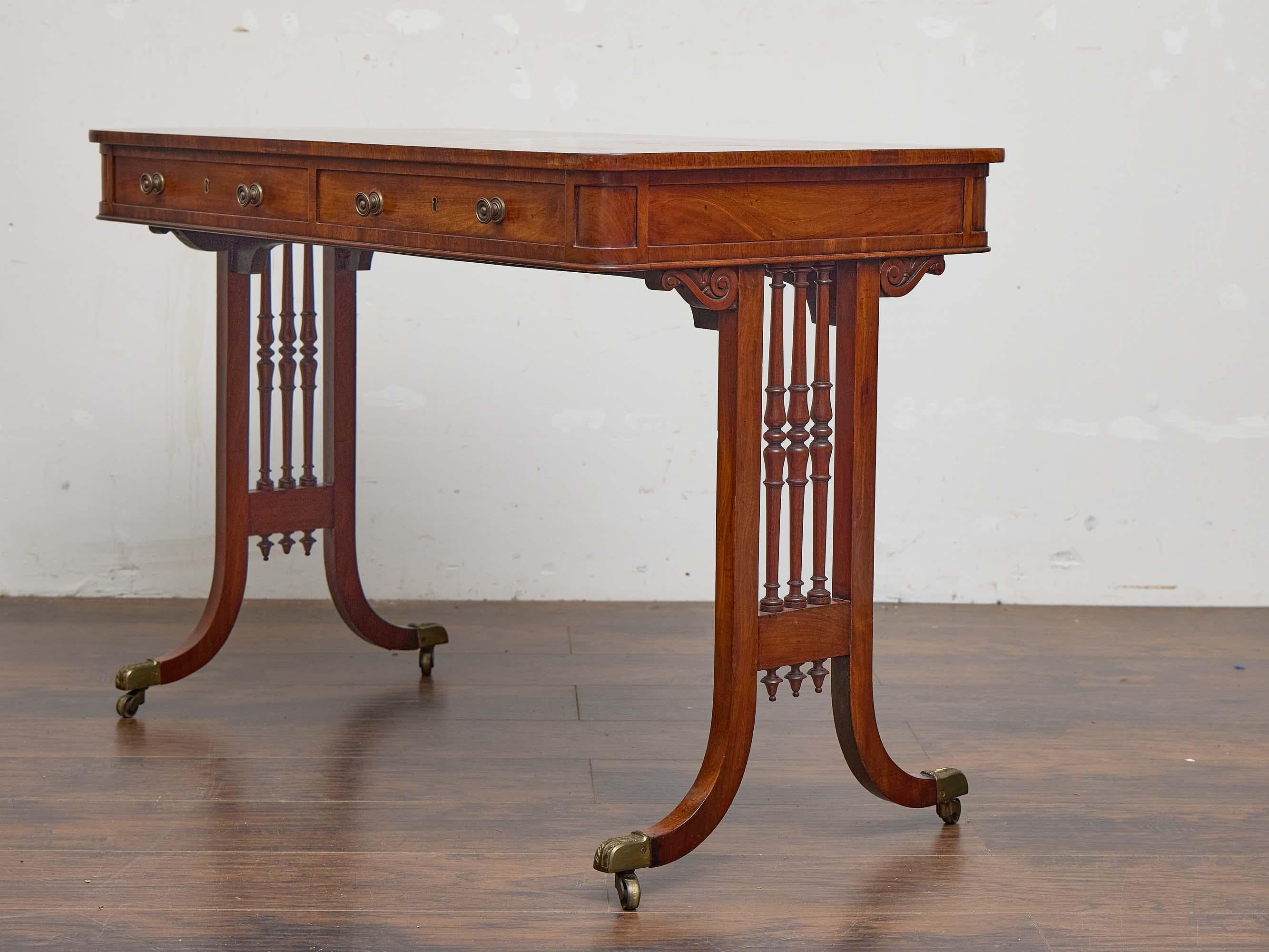 English Regency Mahogany Writing Desk with Pierced Sides and Casters For Sale 2