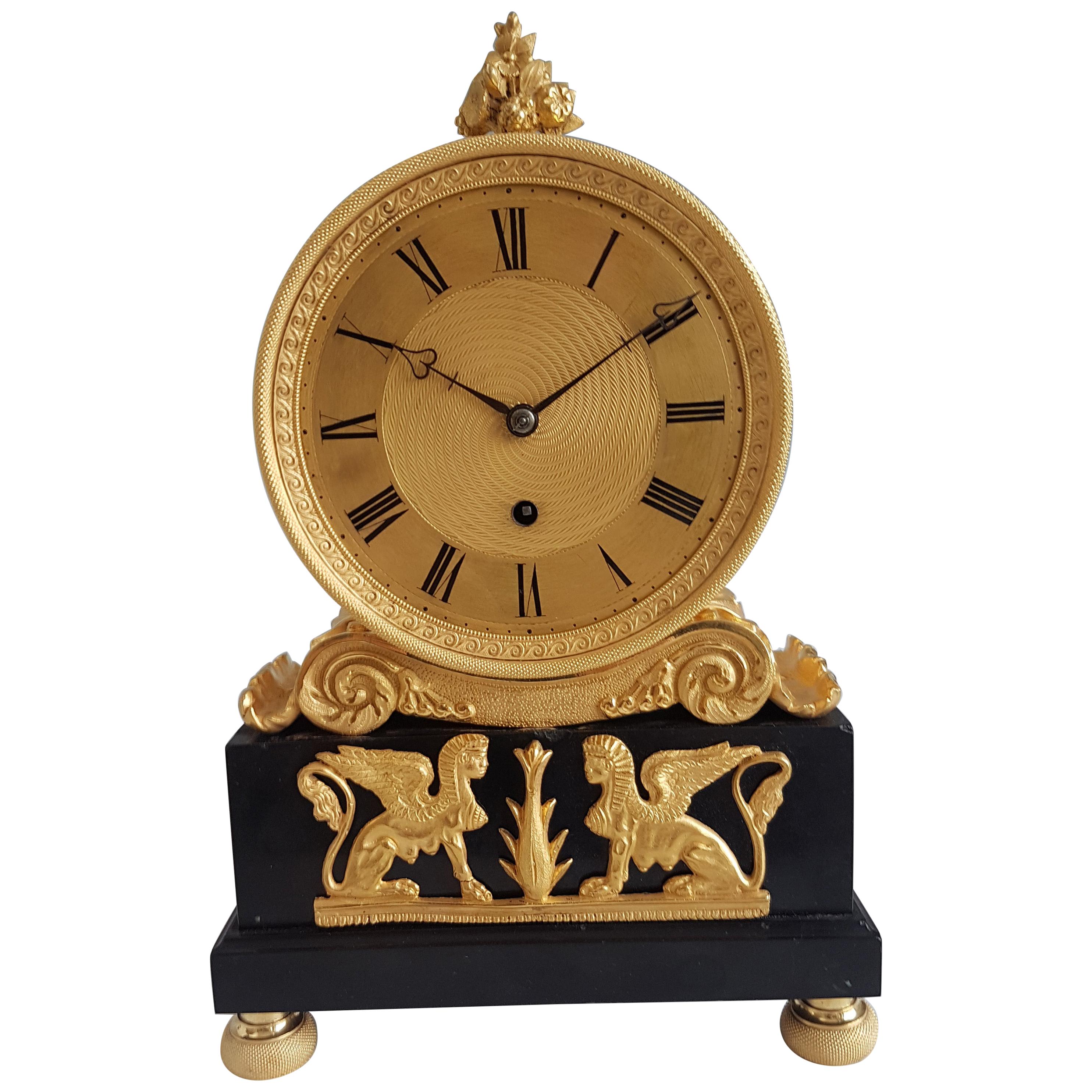 English Regency Mantel Clock in Ormolu and Derbyshire Black Marble Signed French