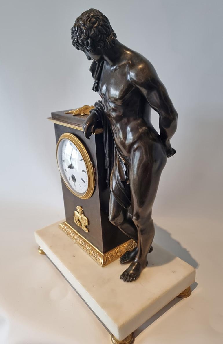 Patinated English Regency Neo Classical mantel clock of Aristaeus For Sale