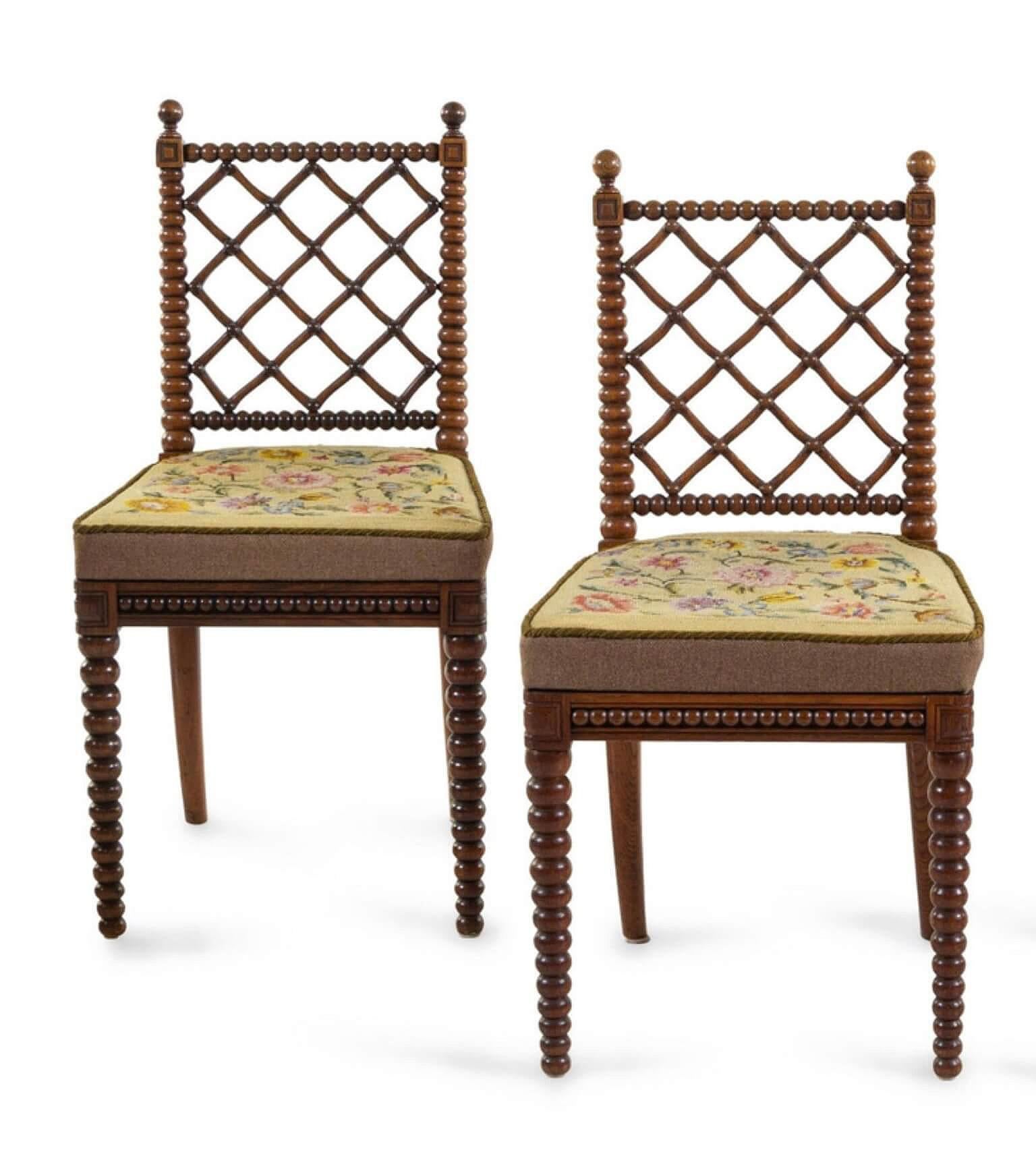 A wonderful and rare set of four English late Regency, circa 1825 side chairs attributed to legendary firm Gillows of Lancaster having bobbin turned solid pollard oak frames with rectangular 'lattice' backs and upholstered seats.