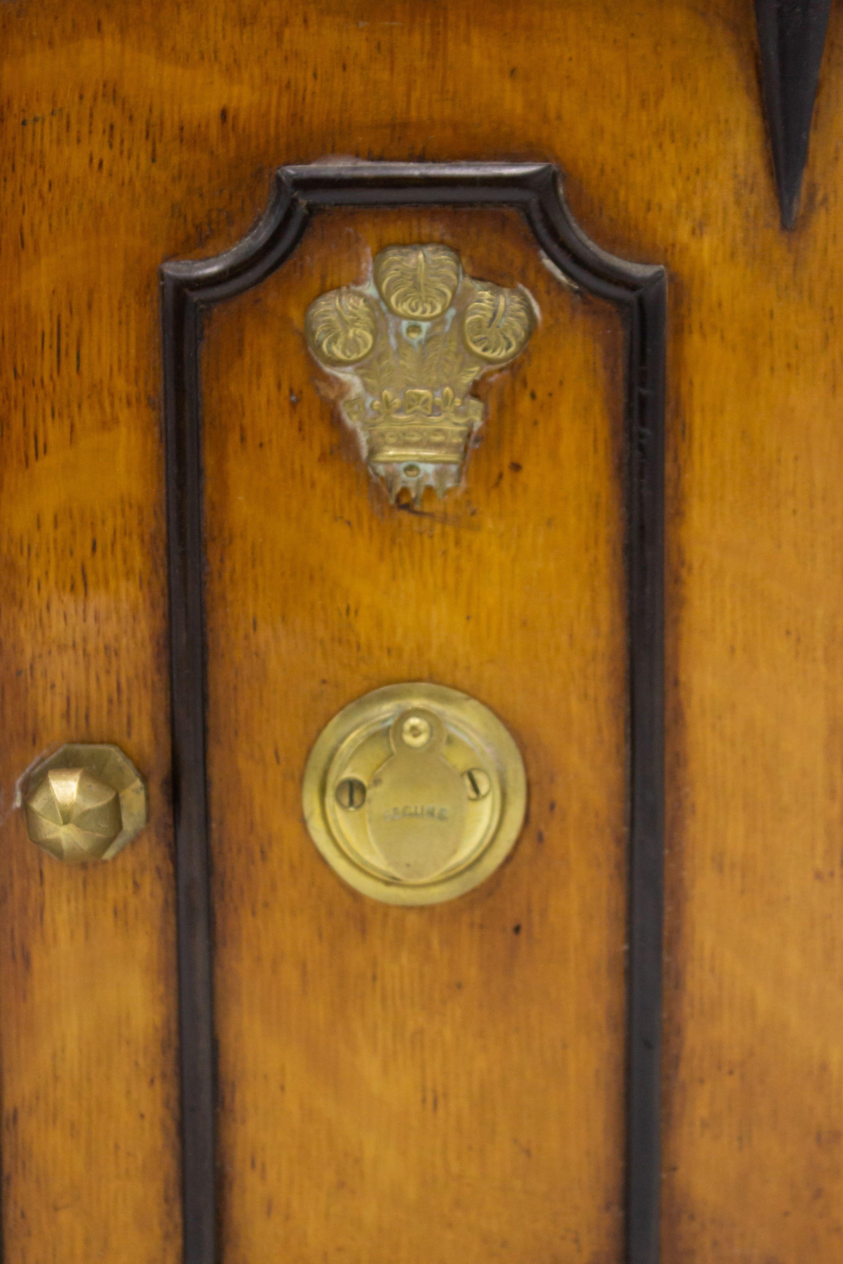 English Regency-style (19th century) pollard oak men's miniature jewelry cabinet with 2 doors and brass plume crest.
     