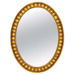 English Regency Oval Giltwood Mirror