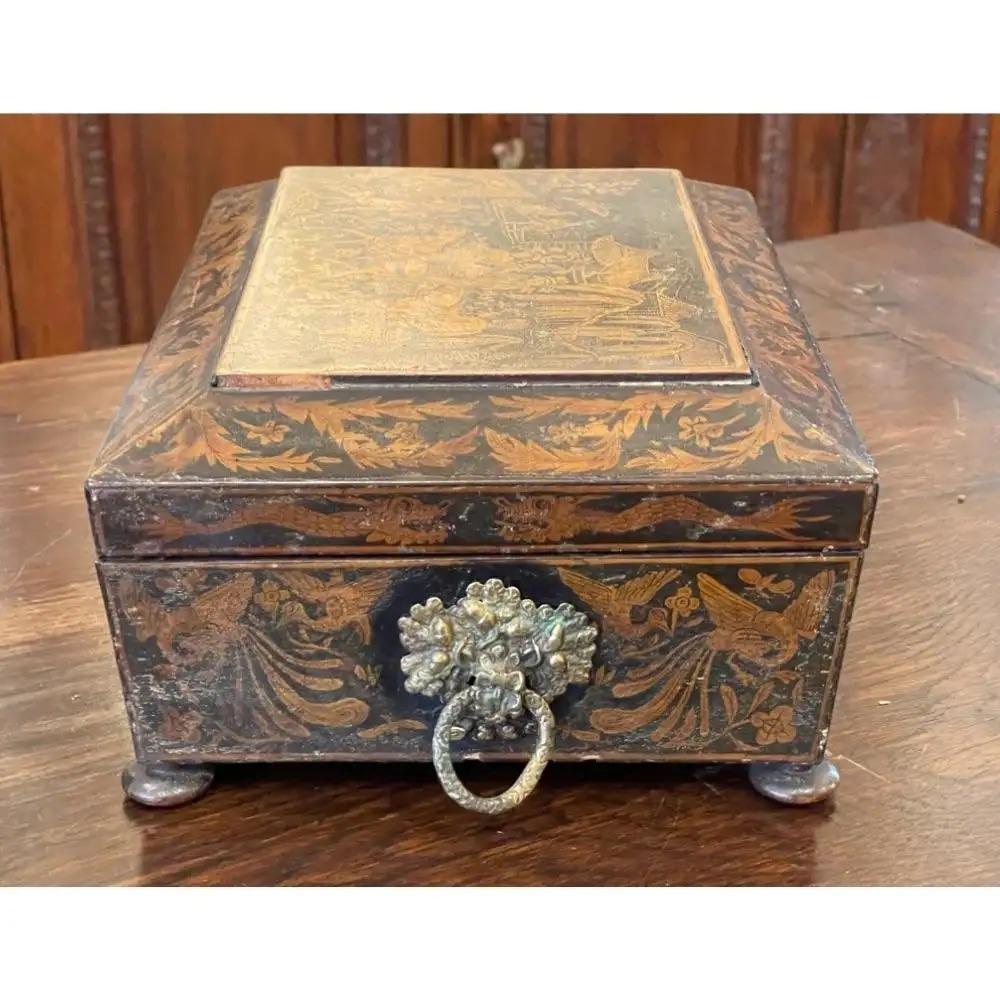 English penwork double-handled jewelry box, with sectioned insert. Decorated with Chinoiserie-style themes. 4” h. x 9