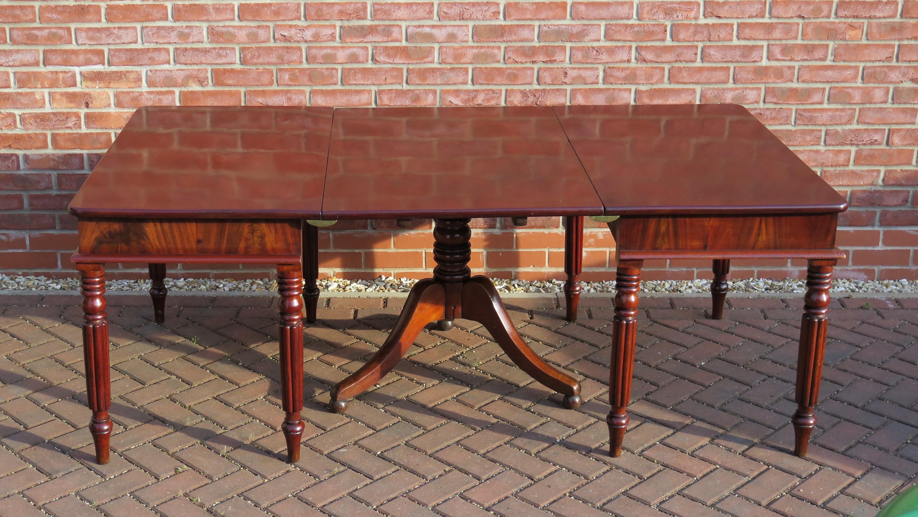 English Regency Period Extending Dining Table with centre pedestal,  Circa 1810 10