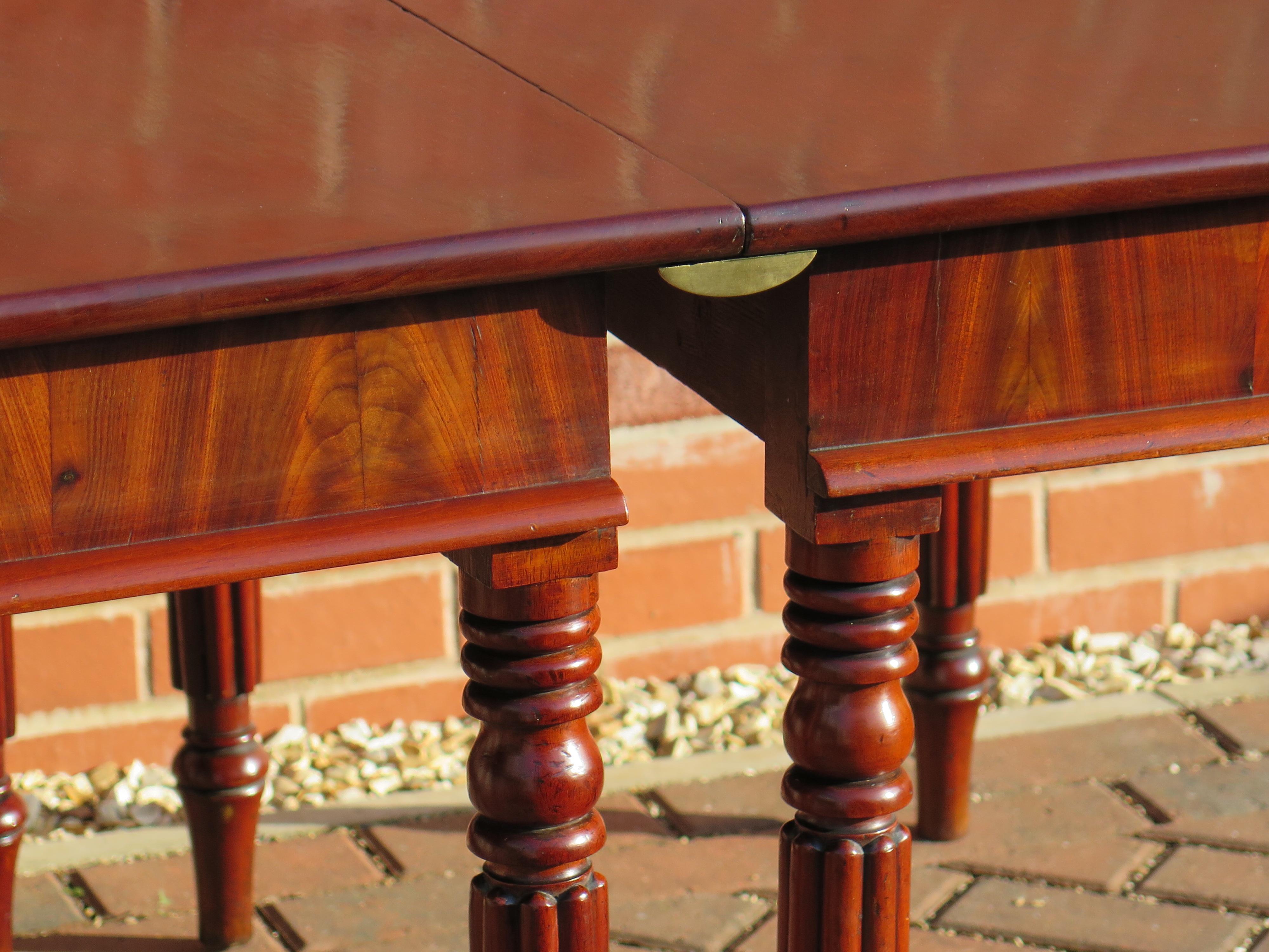 English Regency Period Extending Dining Table with centre pedestal,  Circa 1810 11