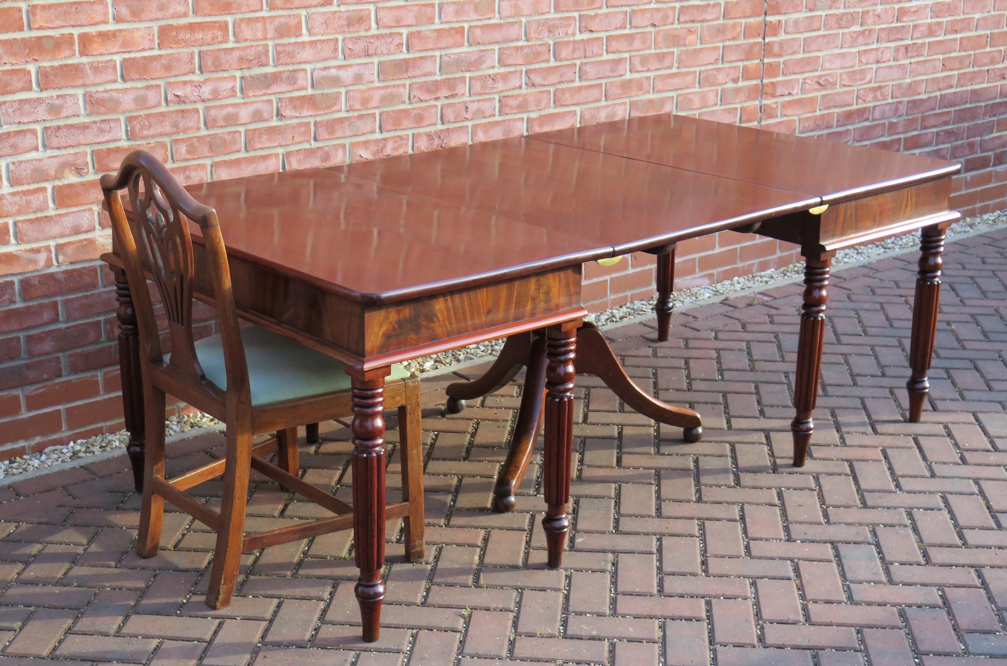 English Regency Period Extending Dining Table with centre pedestal,  Circa 1810 12