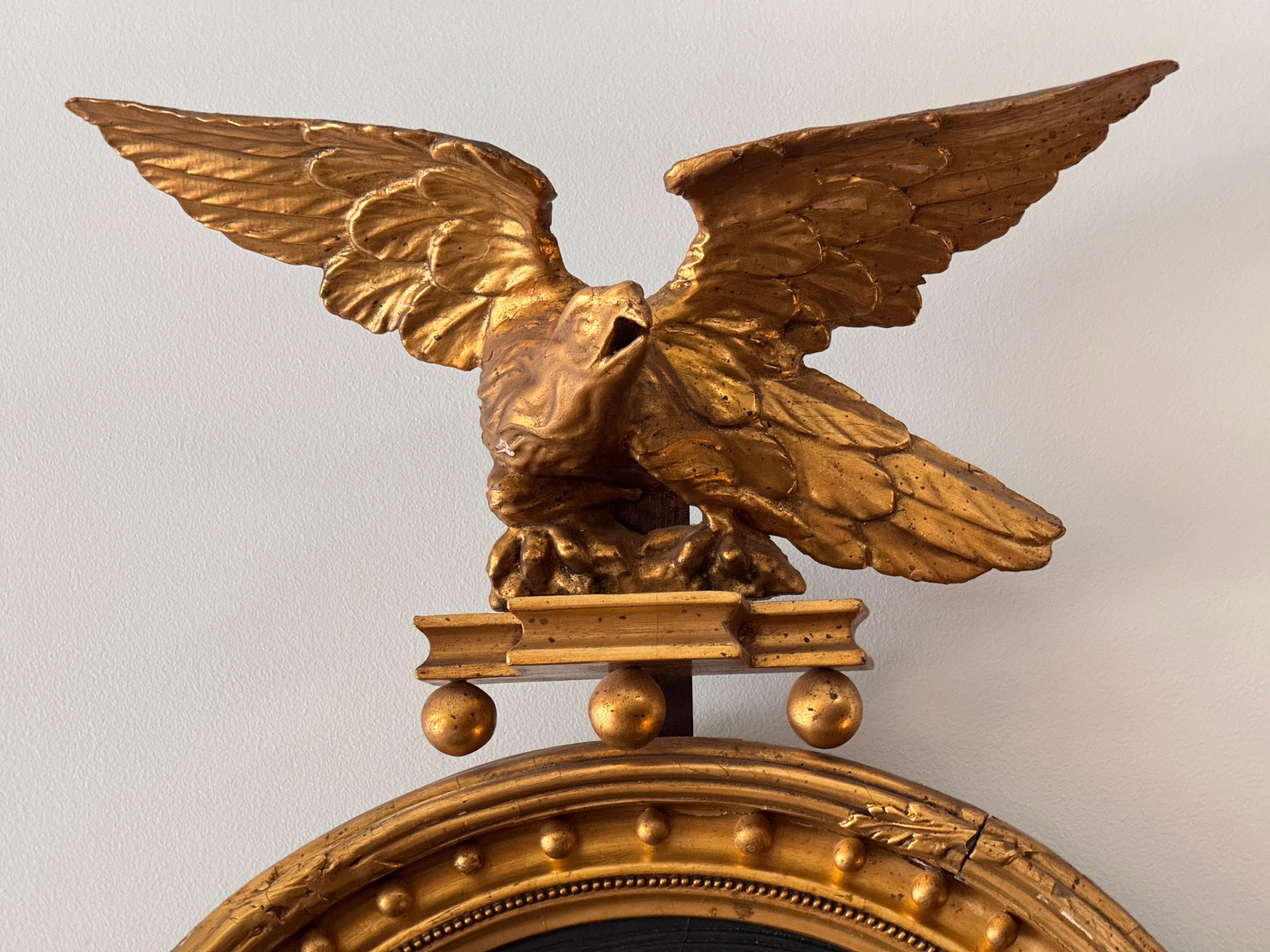 19th Century English Regency Period Giltwood Girandole Mirror with Eagle Crest For Sale