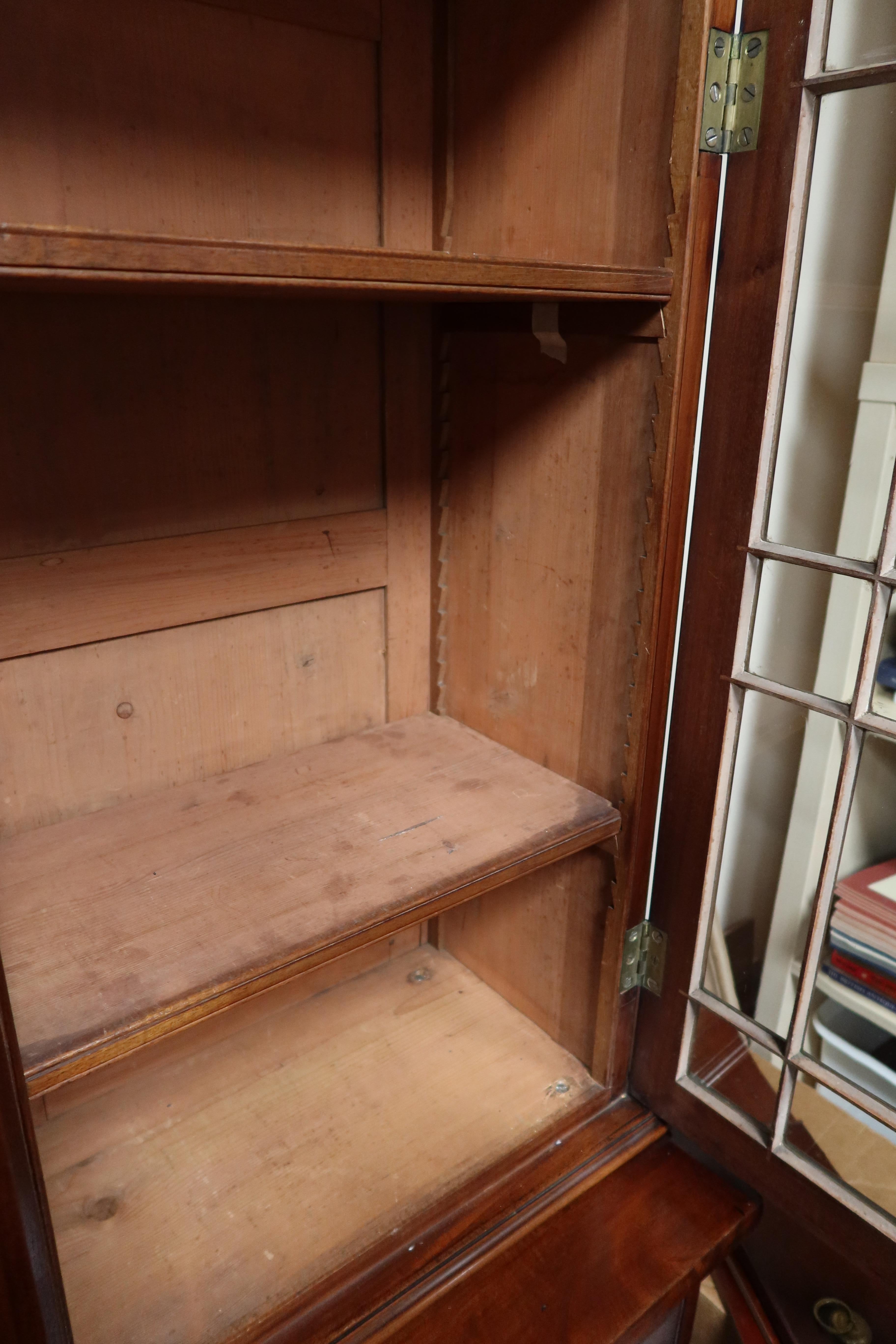 Glass English Regency Period Mahogany Breakfront Bookcase of Smaller Scale, circa 1810 For Sale