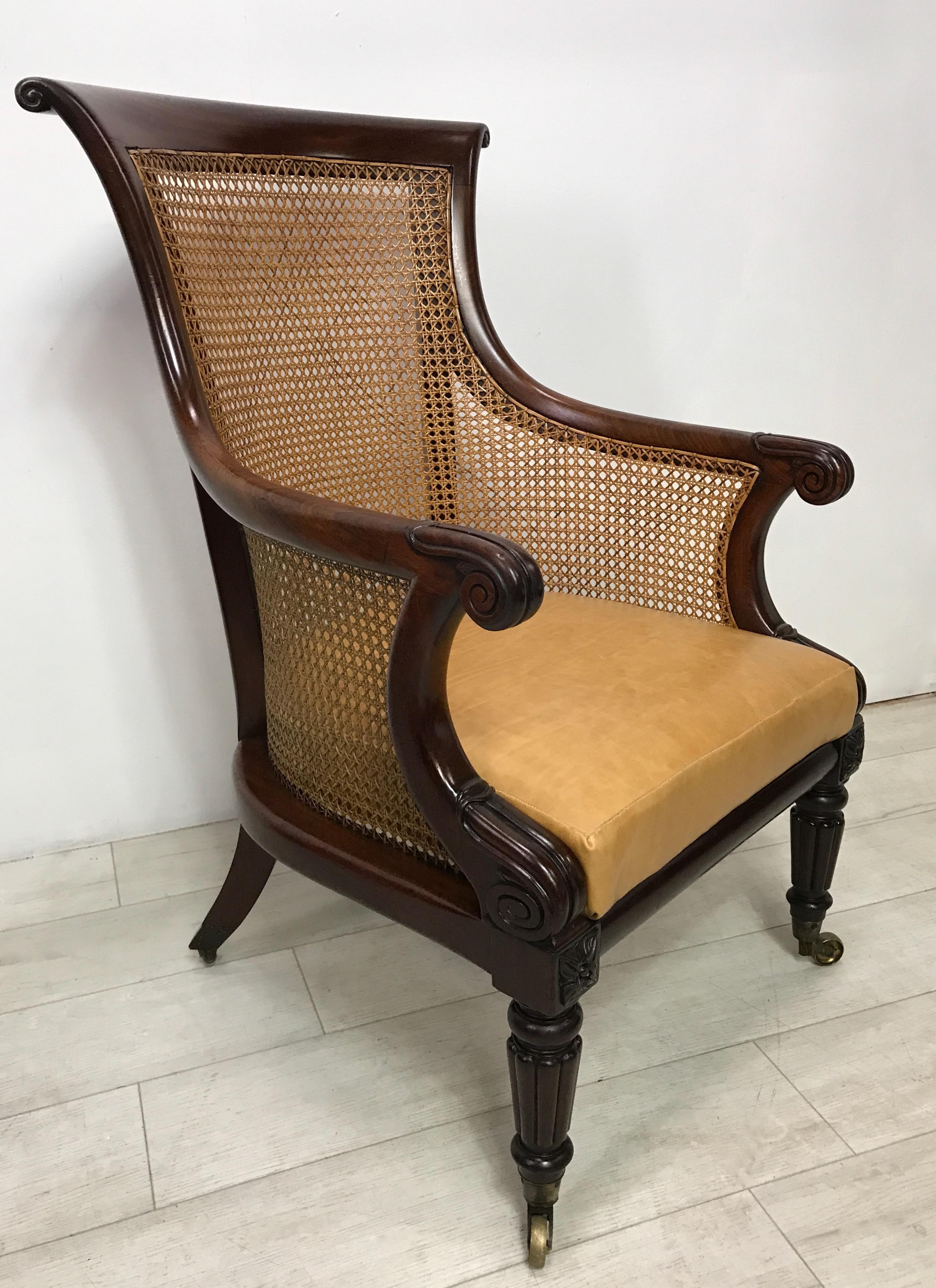 Carved English Regency Period Mahogany and Caned Library Armchair, Early 19th Century