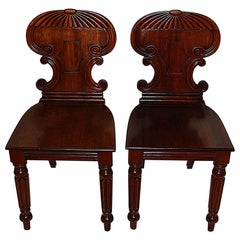 English Regency Period Pair of Carved Mahogany Hall Chairs