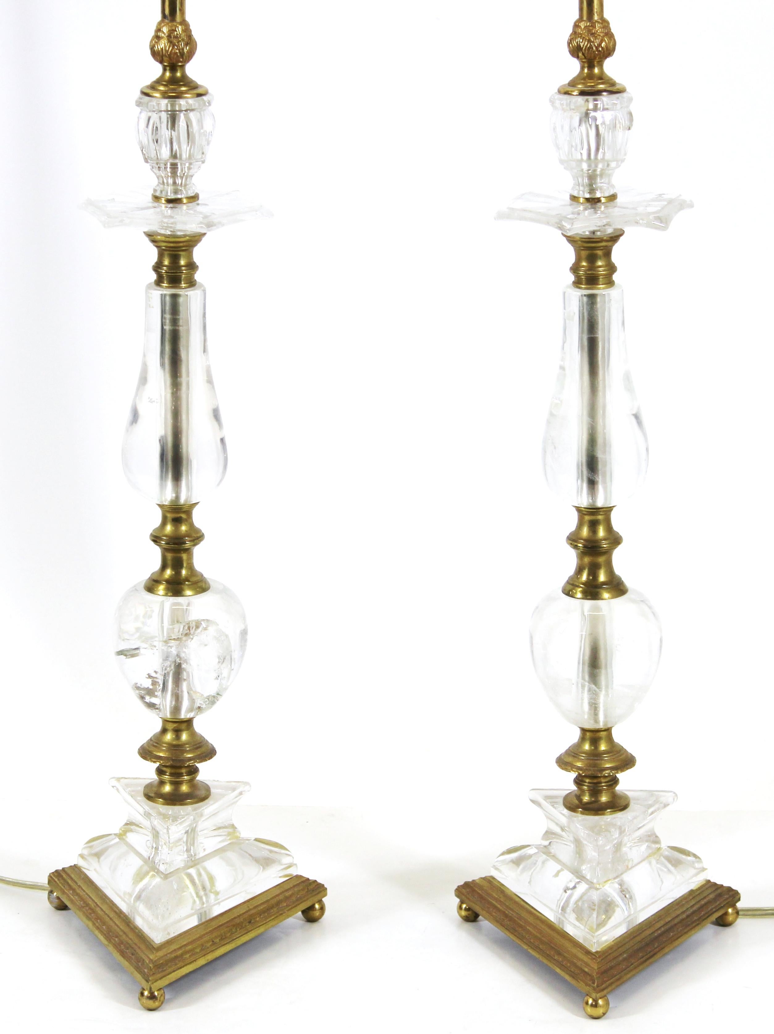 English Regency rock crystal and gilt bronze pair of candlesticks turned into table lamps, likely early to mid-19th century.