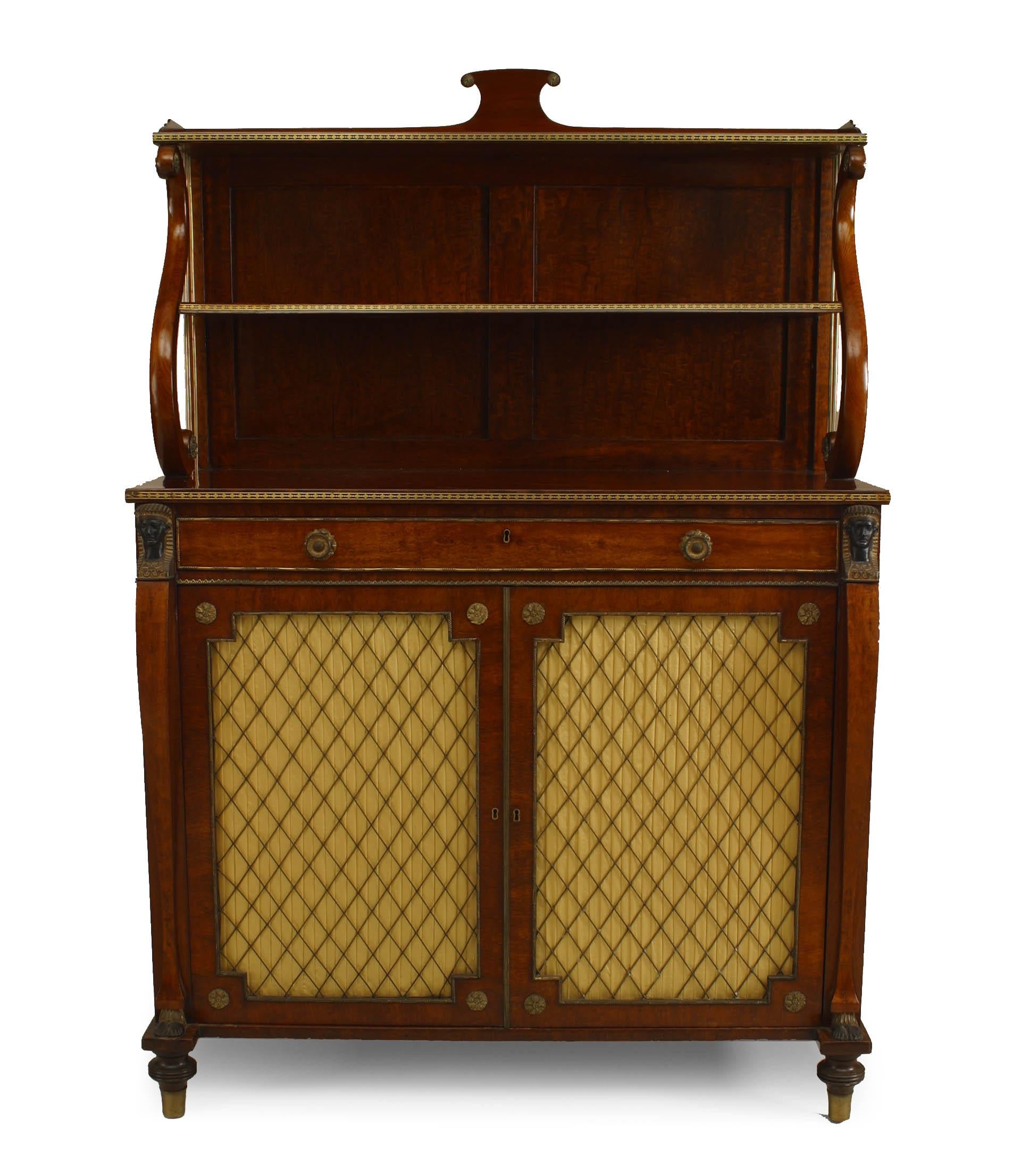 English Regency rosewood secretaire cabinet with two upper shelves supported by a lyre form over a secretaire drawer fitted with a leather writing surface above a pair of grill doors.
