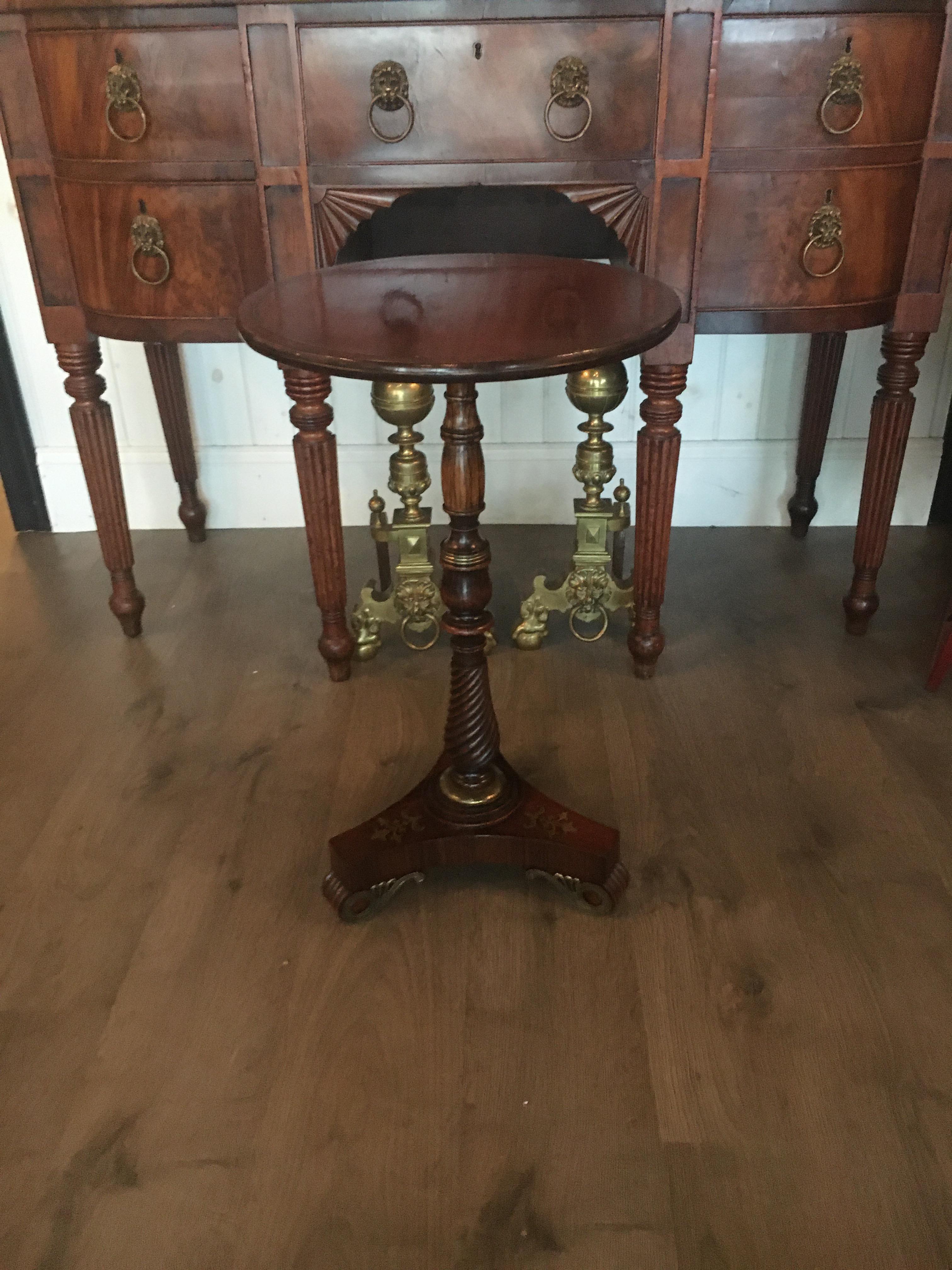 Early 19th century English regency rosewood side table with brass inlay and mount's. Great color and patination. Perfect drinks table.