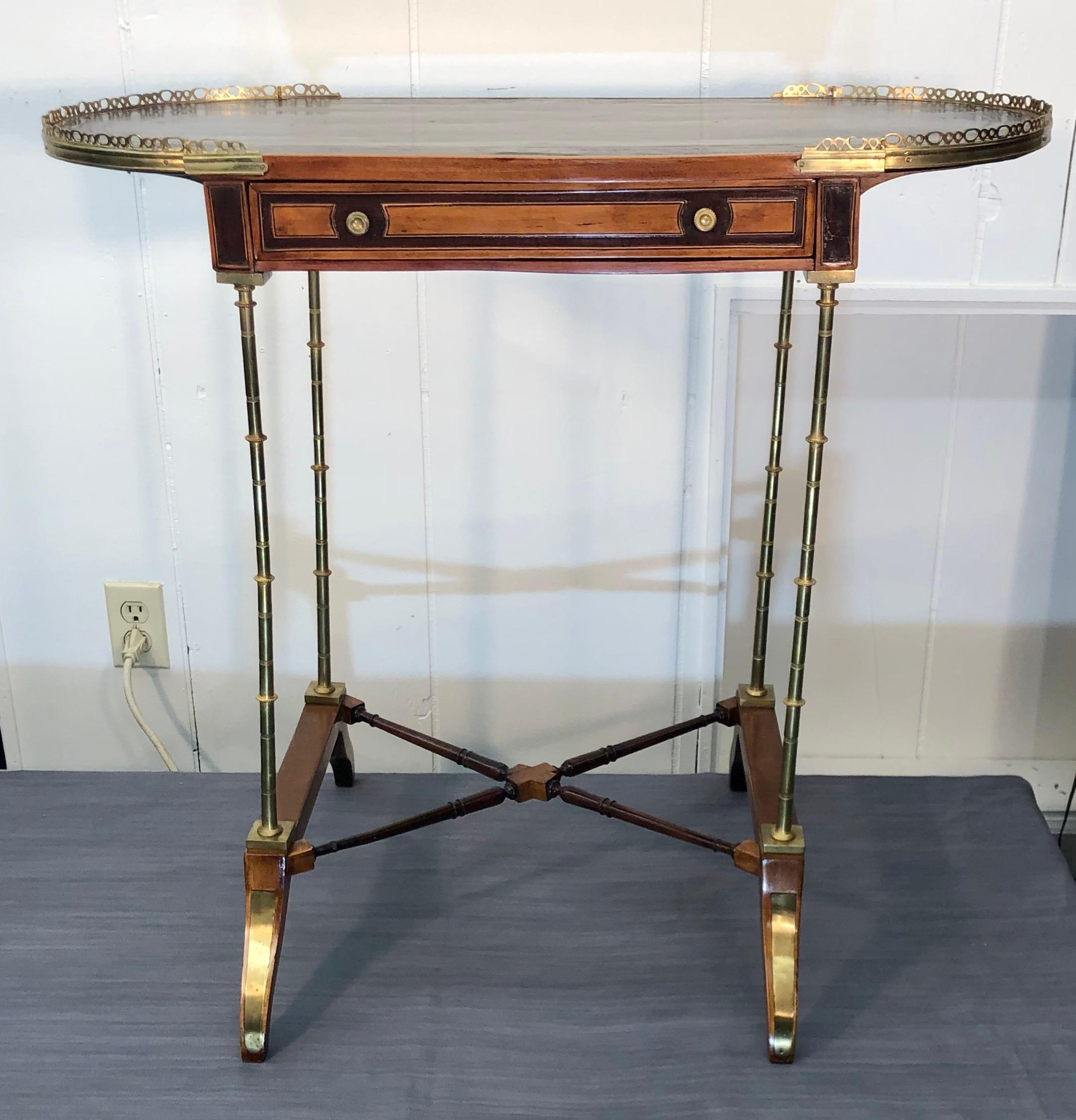 This Neoclassical Table is made by the preeminent maître-ébéniste (master cabinetmaker) Adam Weisweiler (1744 - 1820). The Sophisticated Neoclassical Work Table is finished on both sides with satinwood and mahogany veneers. The writing surface has a