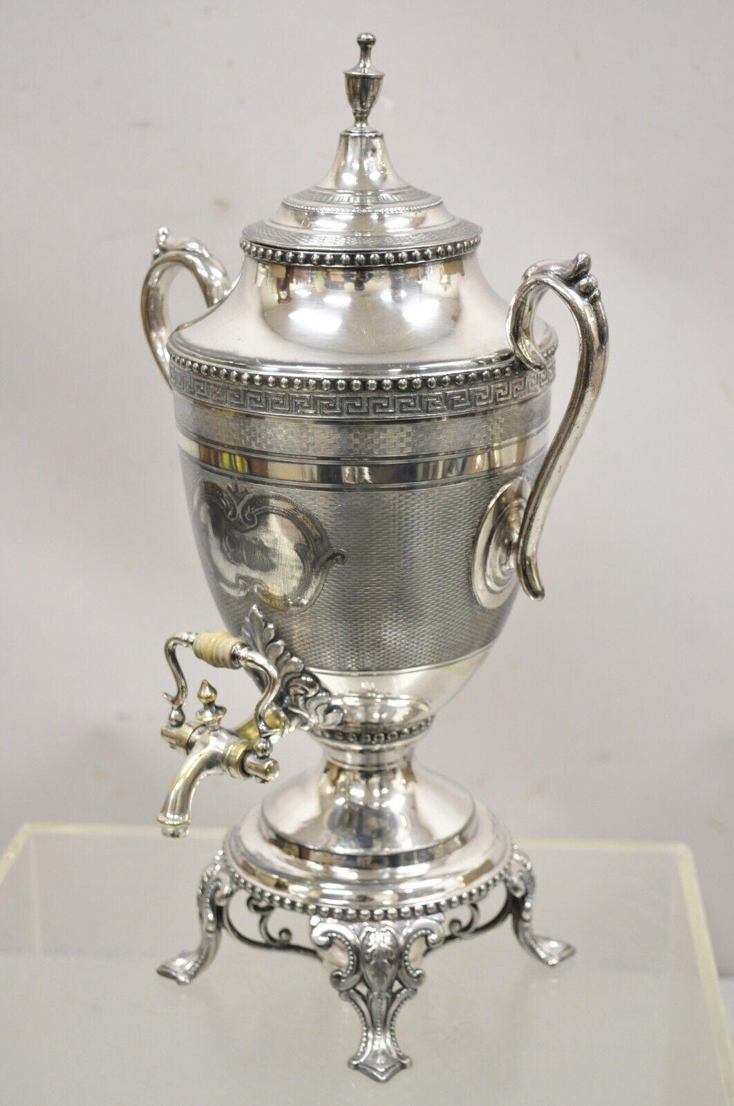 Antique English Regency Silver Plated Urn Twin Handle Coffee Drink Dispenser Samovar. Item features monogram to center (illegible), ornate twin handles, fancy feet, very nice antique item, quality English craftsmanship, great style and form. Circa