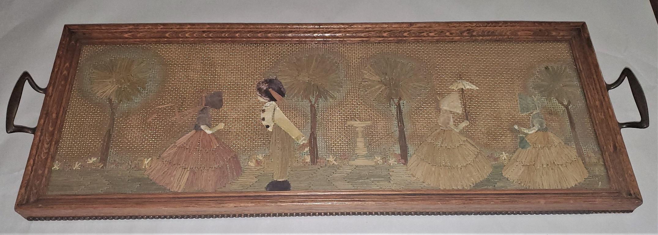Presenting a gorgeously rare regency straw and felt sampler serving tray.

English from the Regency Era and the Time of Jane Austen’, 1795-1815.

This original ‘Sampler’ is made of a gilt and hand painted lattice work fabric mounted on board. It