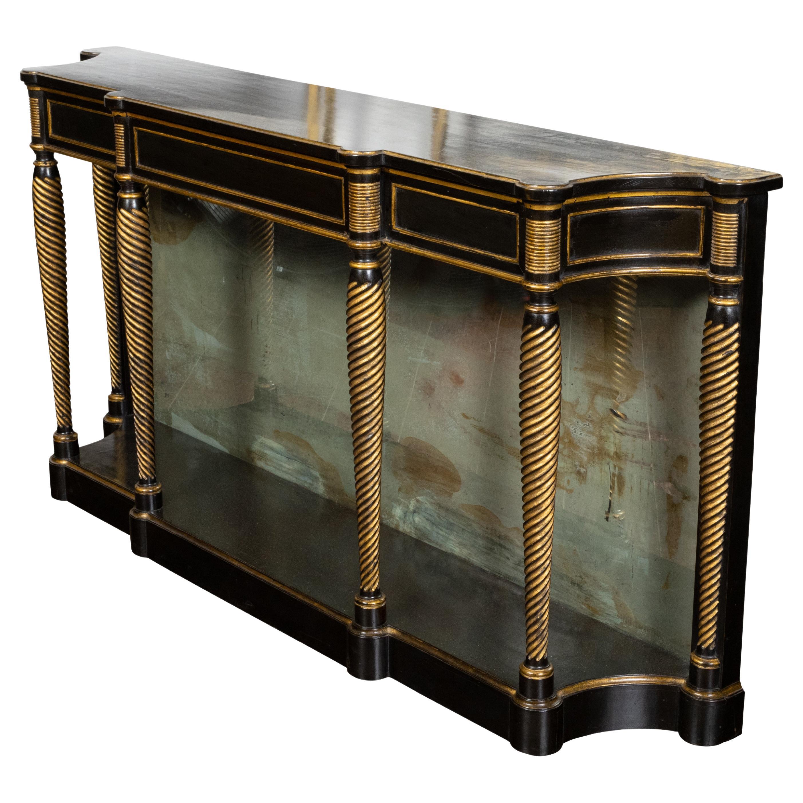 Table console de style Régence anglaise des années 1920 en or et noir ébénisé avec miroir