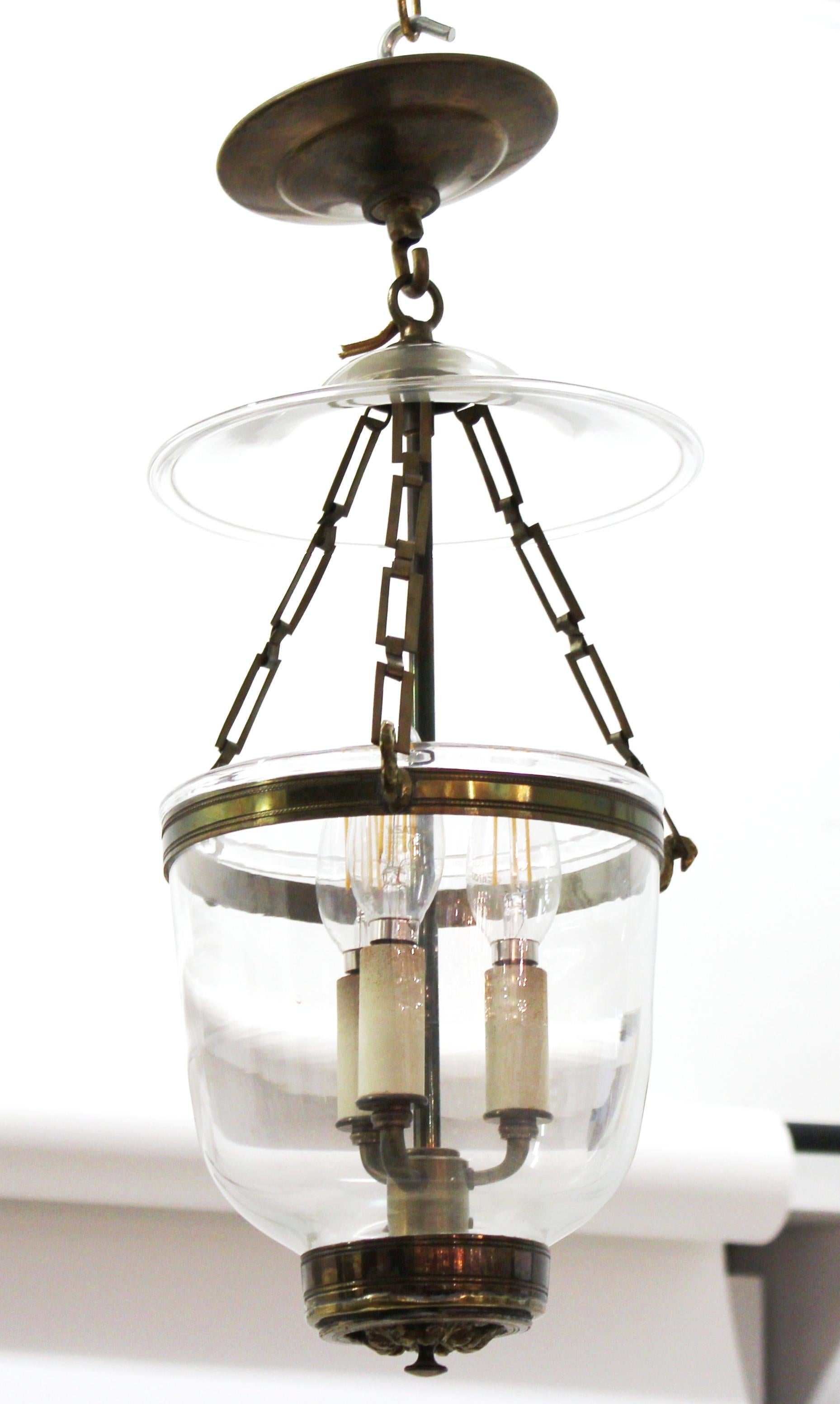 English Regency style pair of bell jar lanterns with glass shades.