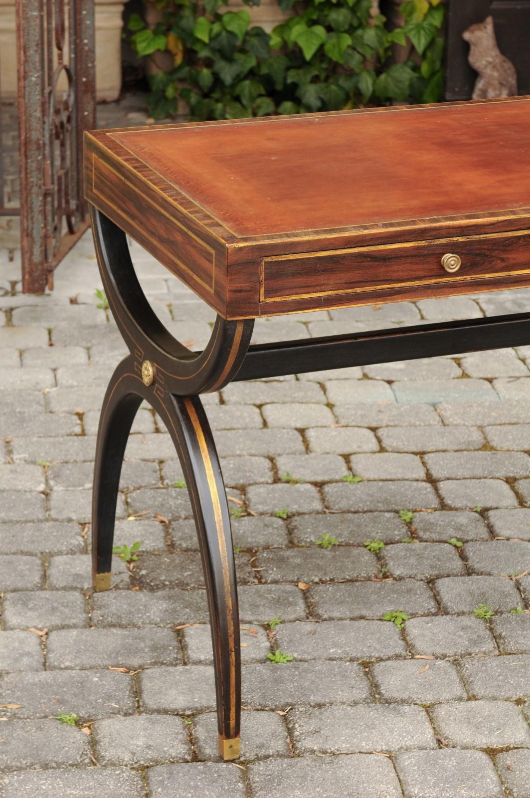 20th Century English Regency Style Black X-Form Base Desk with Leather Top and Gilt Accents