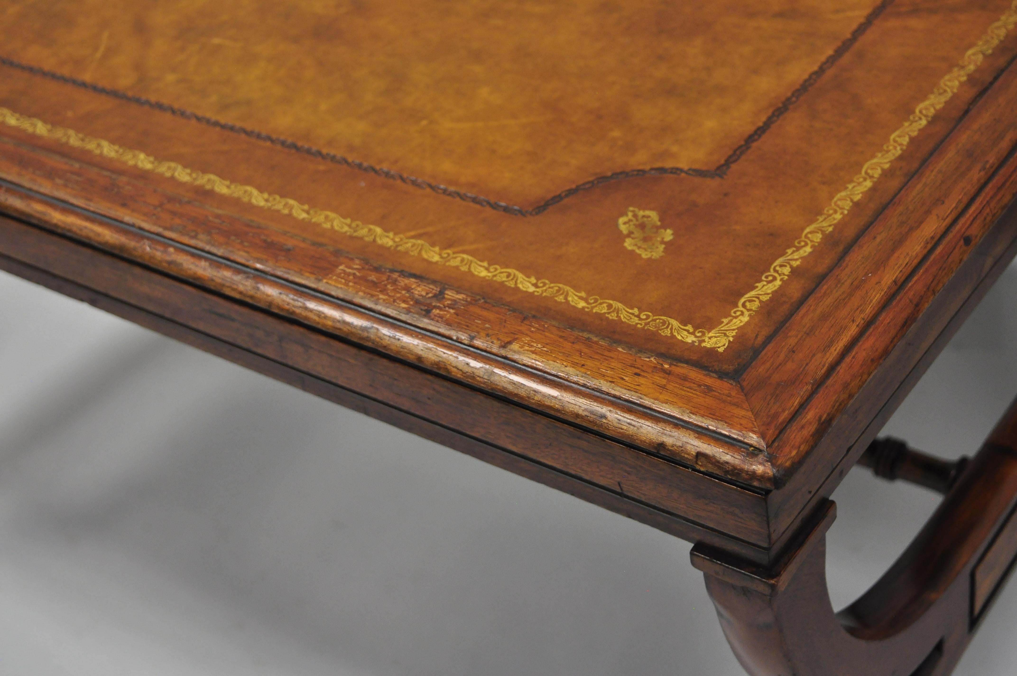 20th Century English Regency Style Brown Tooled Leather Top Curule Base Mahogany Coffee Table