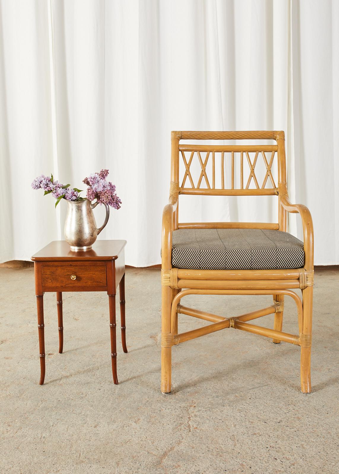 Diminutive mahogany style side table or drink table featuring elegant faux bamboo legs. Made in the English regency taste from radiant grained mahogany. The case is made from 3/4 inch thick pieces of mahogany and has a storage drawer in the front