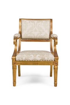 Fauteuil en bois doré et damassé de style Régence anglaise