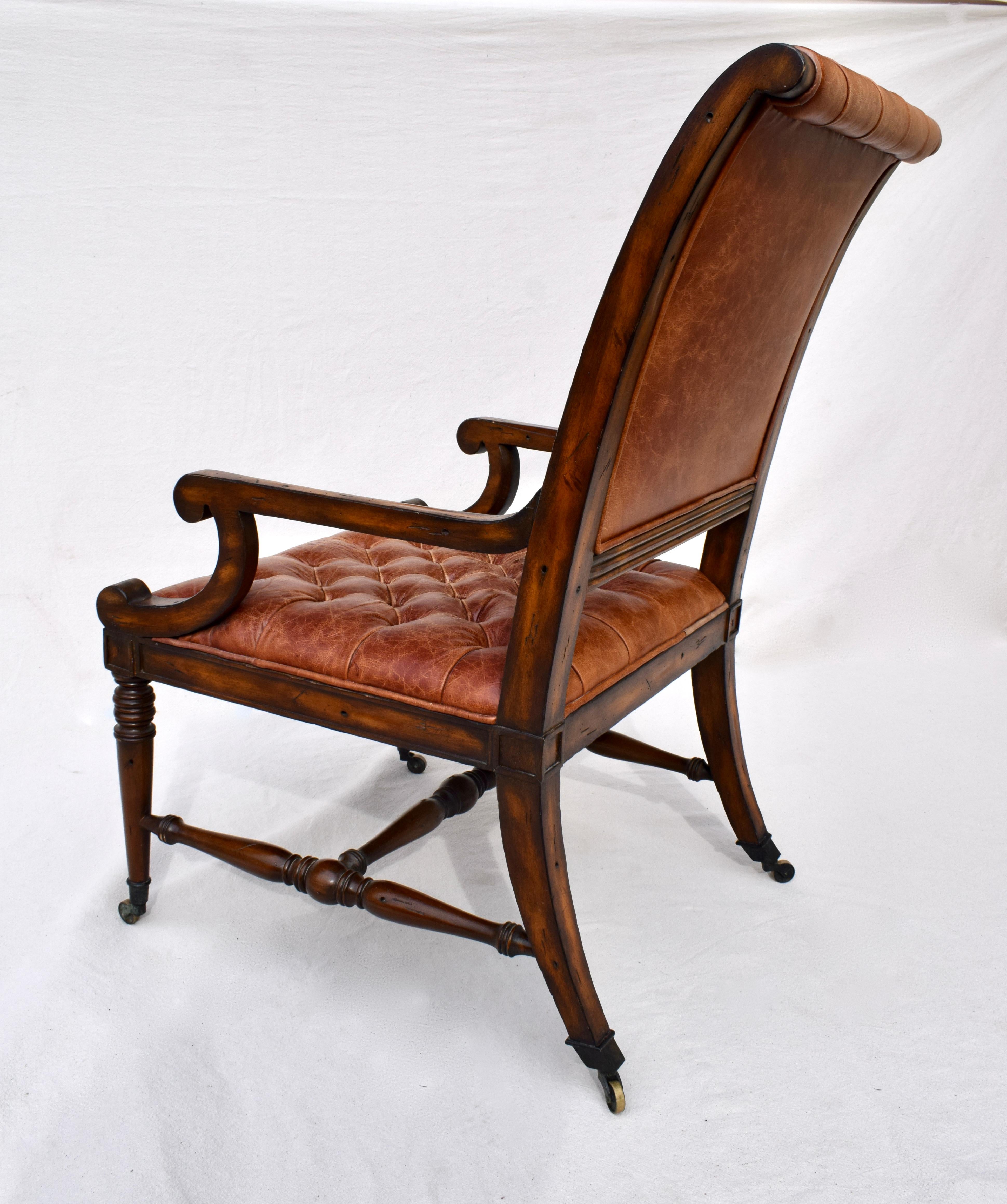 Late 20th Century English Regency Style Leather Library Chair on Brass Casters